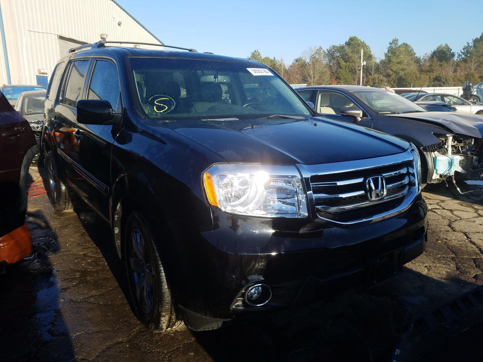 HONDA PILOT TOUR 2014 with VIN 5FNYF3H92EB026436 - Photo from auction