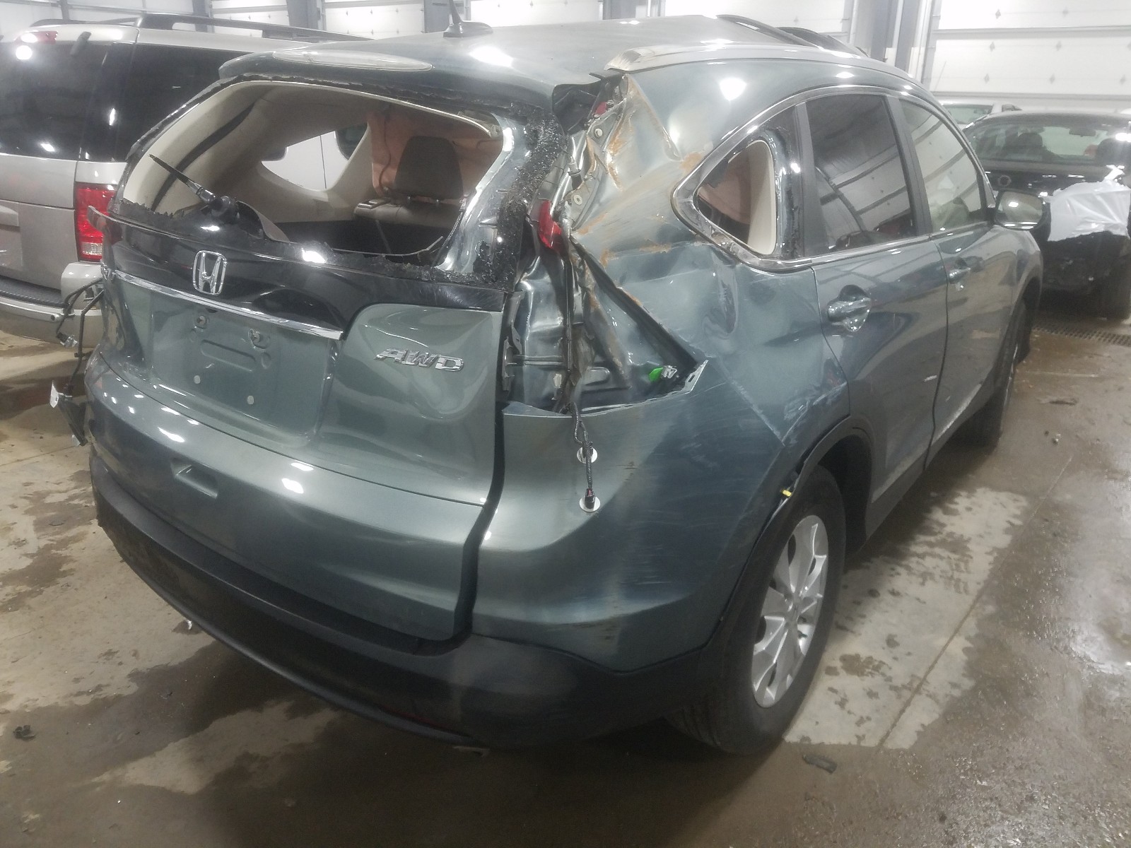 Photo 4 from auction – 2012 HONDA CR-V EXL with VIN 5J6RM4H77CL068703