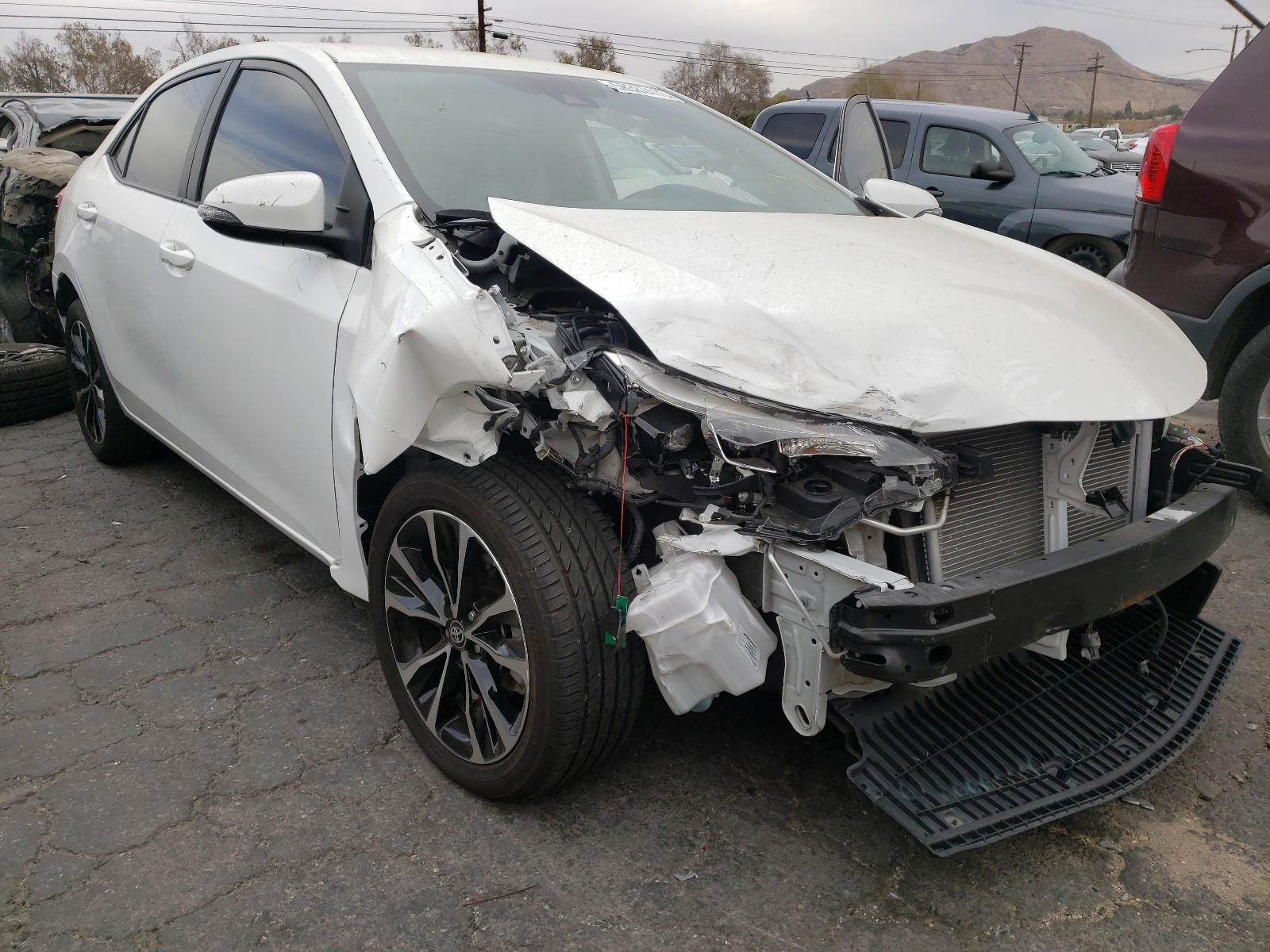 TOYOTA COROLLA L 2018 with VIN 5YFBURHEXJP848279 - Photo from auction