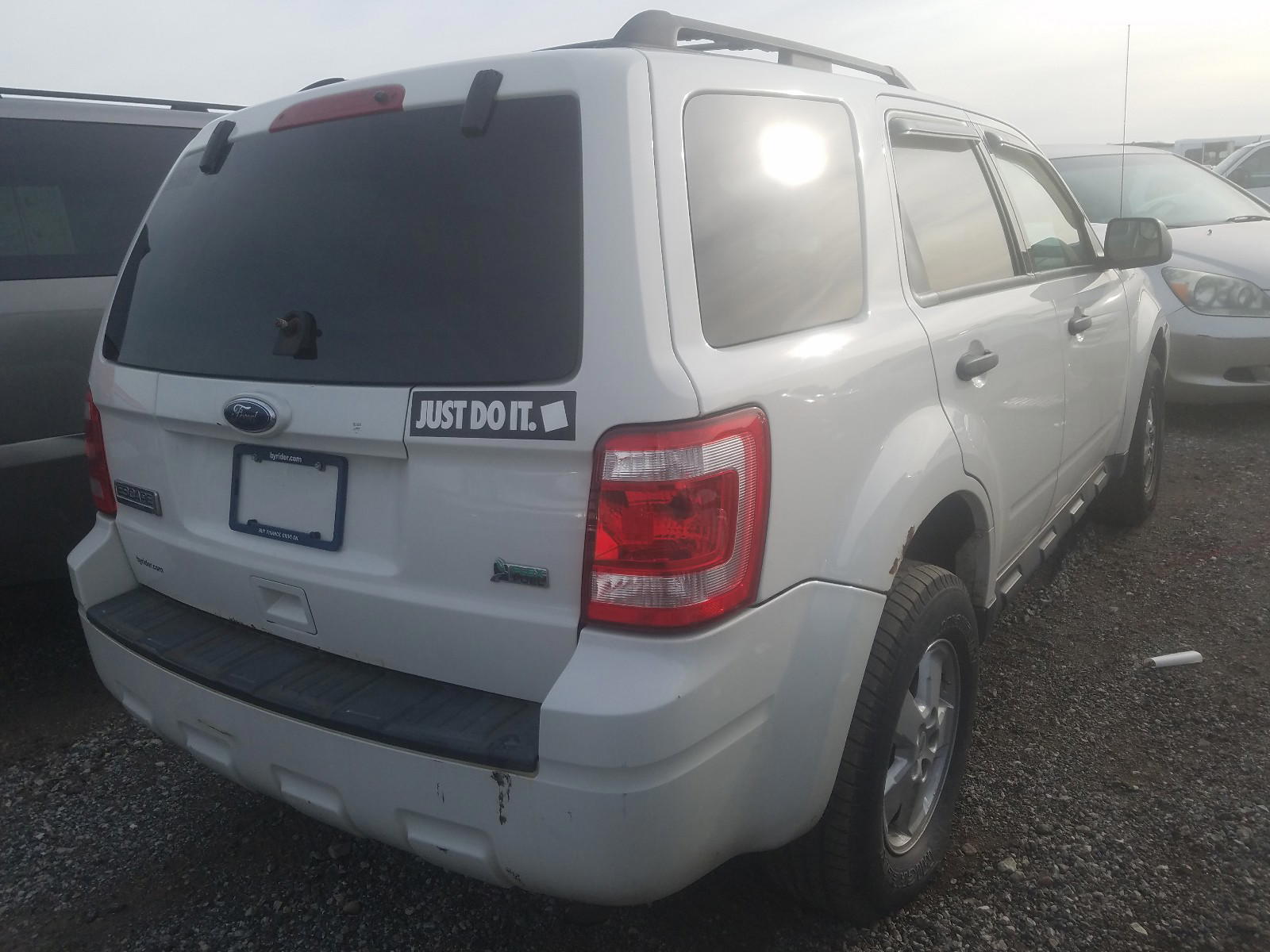 Photo 4 from auction – 2010 FORD ESCAPE XLT with VIN 1FMCU9DG3AKB61179