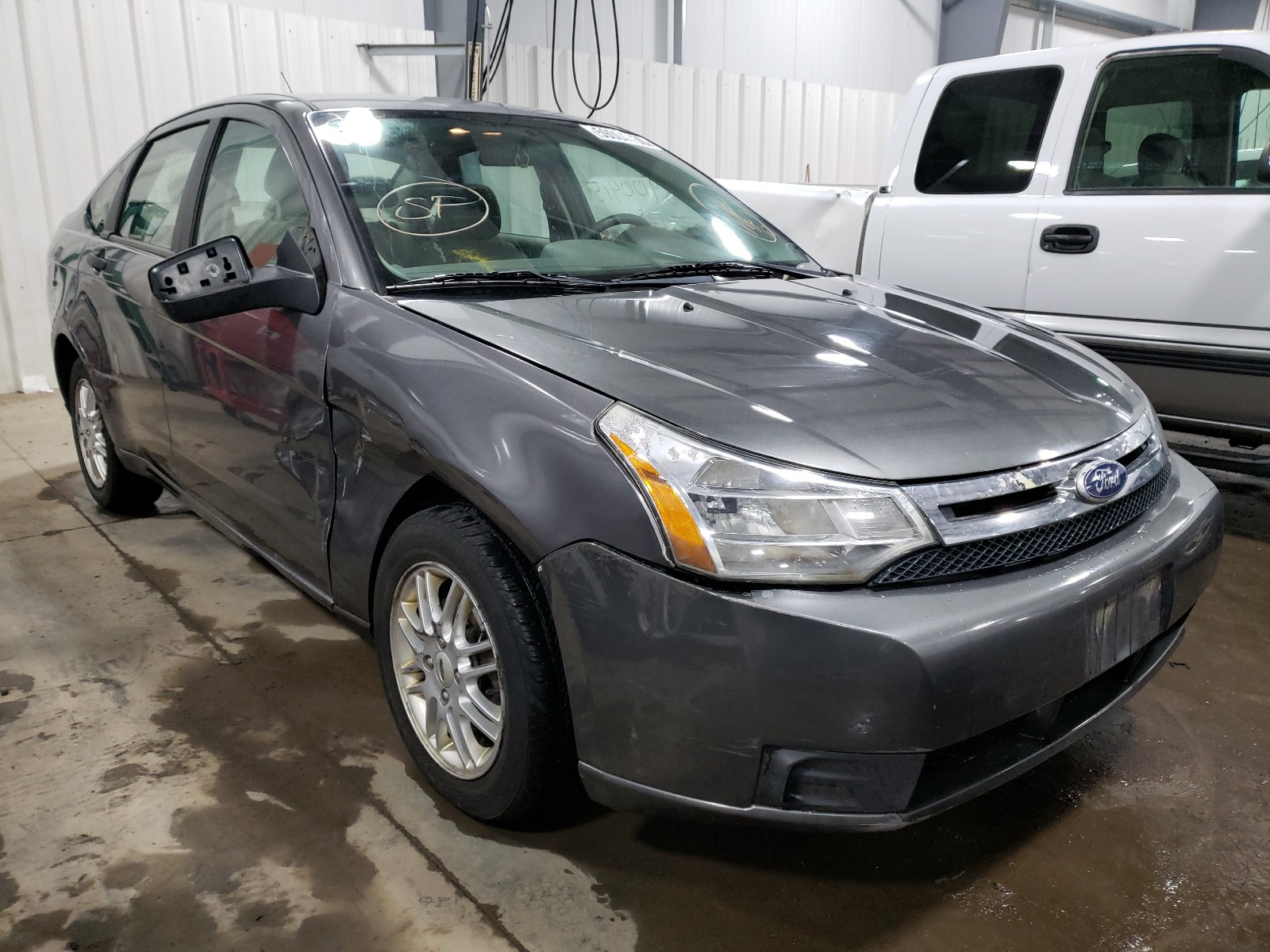 FORD FOCUS SE 2009 with VIN 1FAHP35N69W197518 - Photo from auction