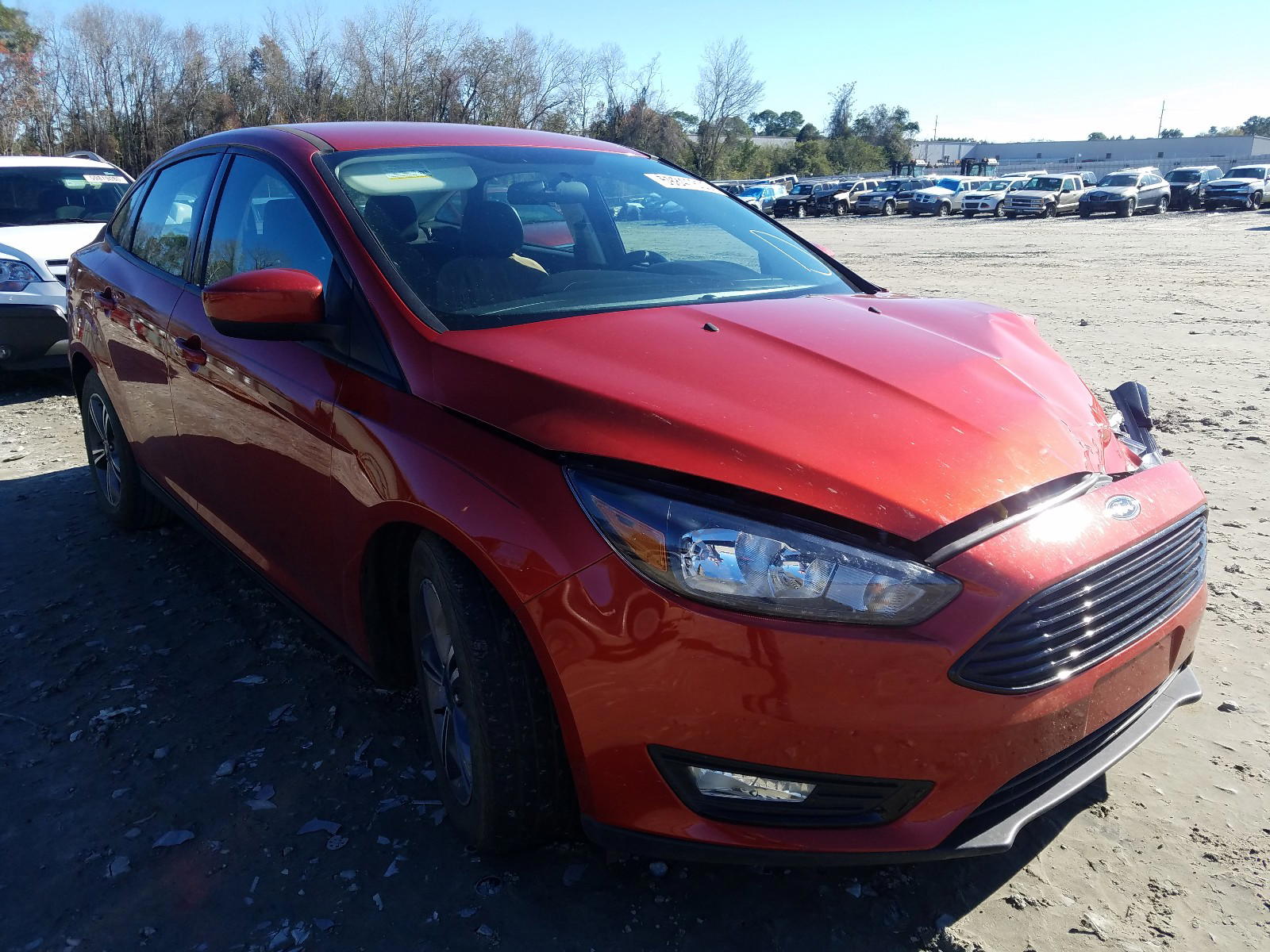 FORD FOCUS SE 2018 with VIN 1FADP3FE3JL265244 - Photo from auction
