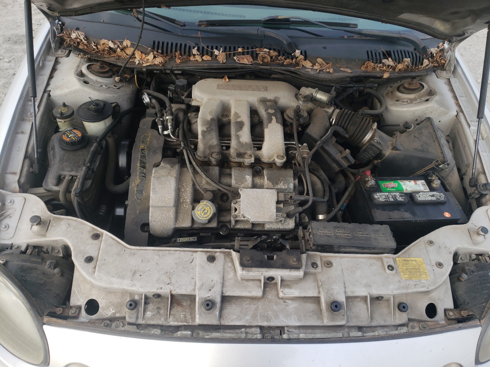 Photo 7 from auction – 1999 FORD TAURUS SE with VIN 1FAFP53S1XG327756