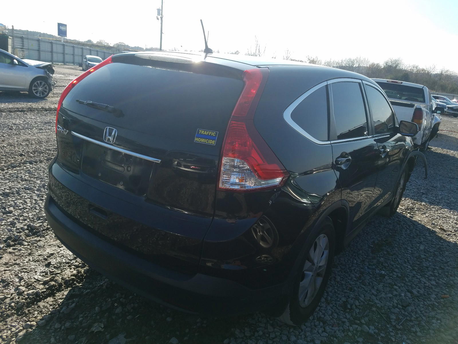Photo 4 from auction – 2012 HONDA CR-V with VIN 5J6RM3H56CL004662