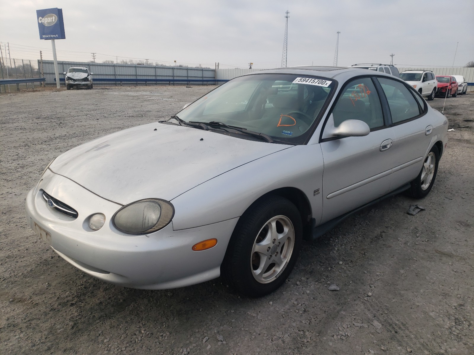 Photo 2 from auction – 1999 FORD TAURUS SE with VIN 1FAFP53S1XG327756
