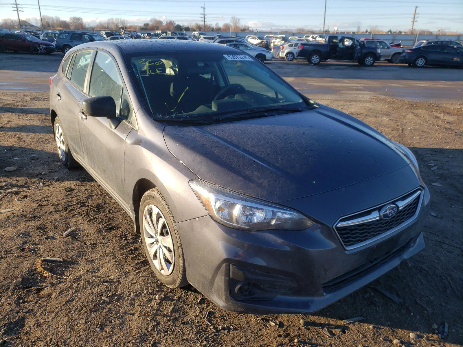 SUBARU IMPREZA 2019 with VIN 4S3GTAA65K3749344 - Photo from auction