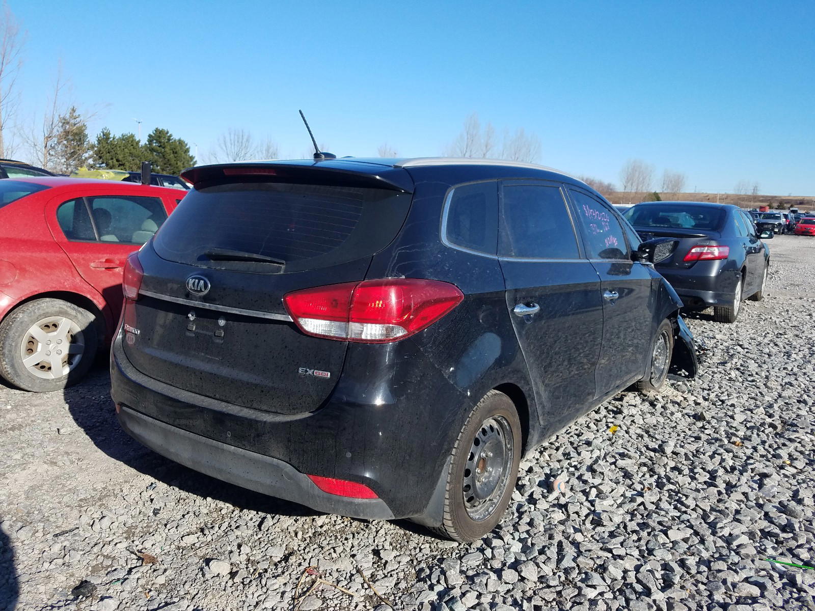 Photo 4 from auction – 2016 KIA RONDO with VIN KNAHU8A35G7126545