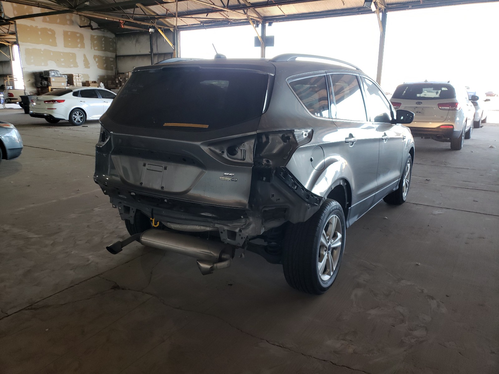 Zdjęcie 4 z aukcji – 2014 FORD ESCAPE SE z VIN 1FMCU9G95EUD19285