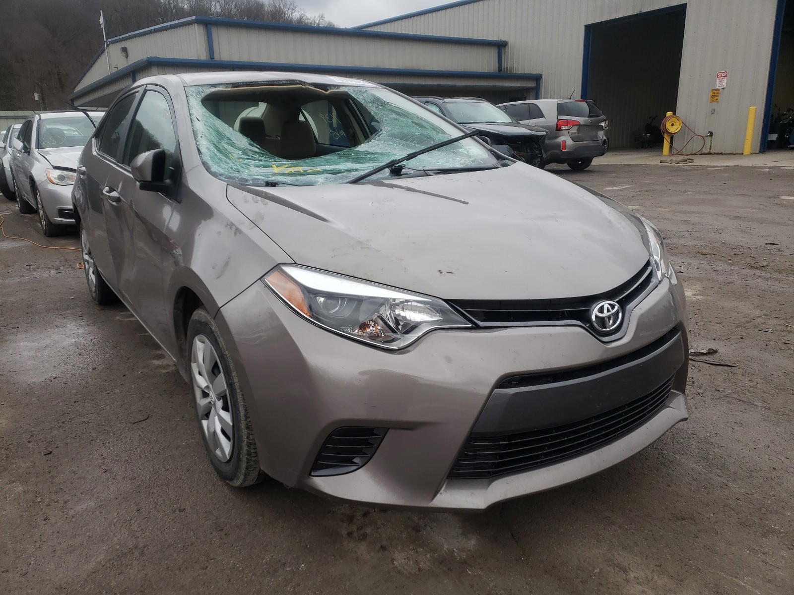 TOYOTA COROLLA L 2015 with VIN 2T1BURHE6FC386200 - Photo from auction