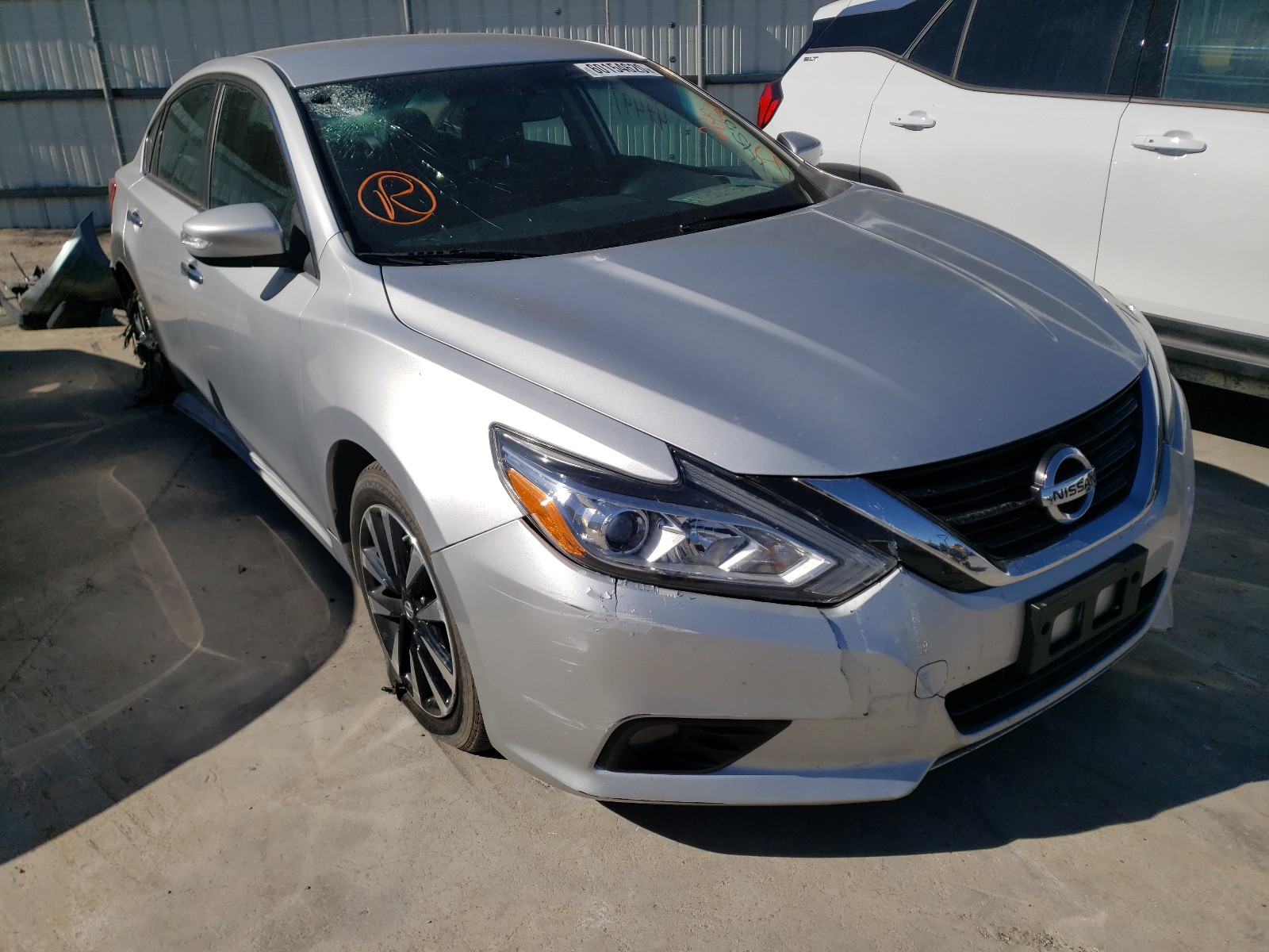 NISSAN ALTIMA 2.5 2018 with VIN 1N4AL3AP2JC264528 - Photo from auction
