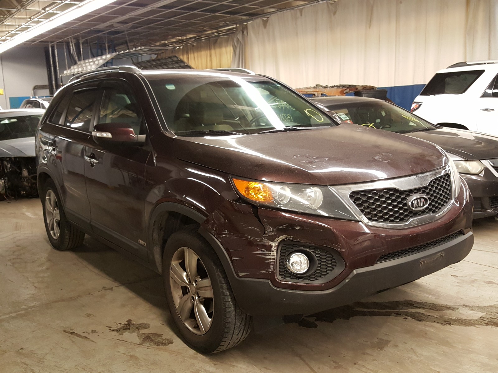 KIA SORENTO EX 2012 with VIN 5XYKUCA63CG242622 - Photo from auction