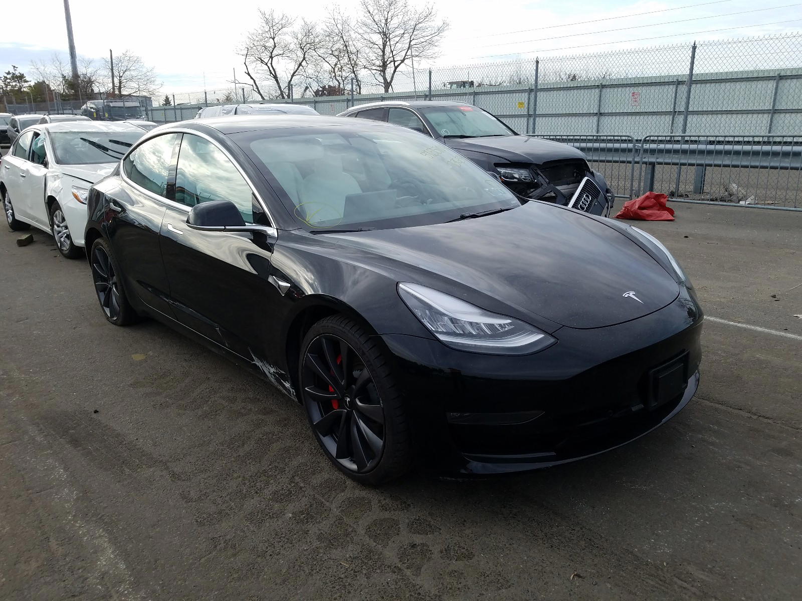 TESLA MODEL 3 2020 with VIN 5YJ3E1ECXLF736344 - Photo from auction