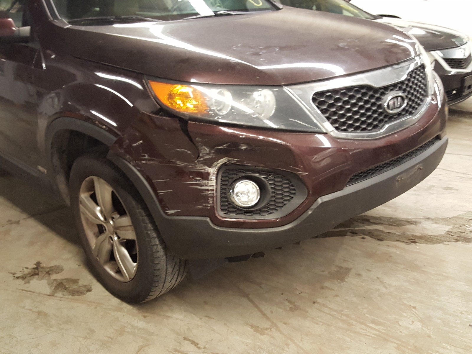 Photo 9 from auction – 2012 KIA SORENTO EX with VIN 5XYKUCA63CG242622