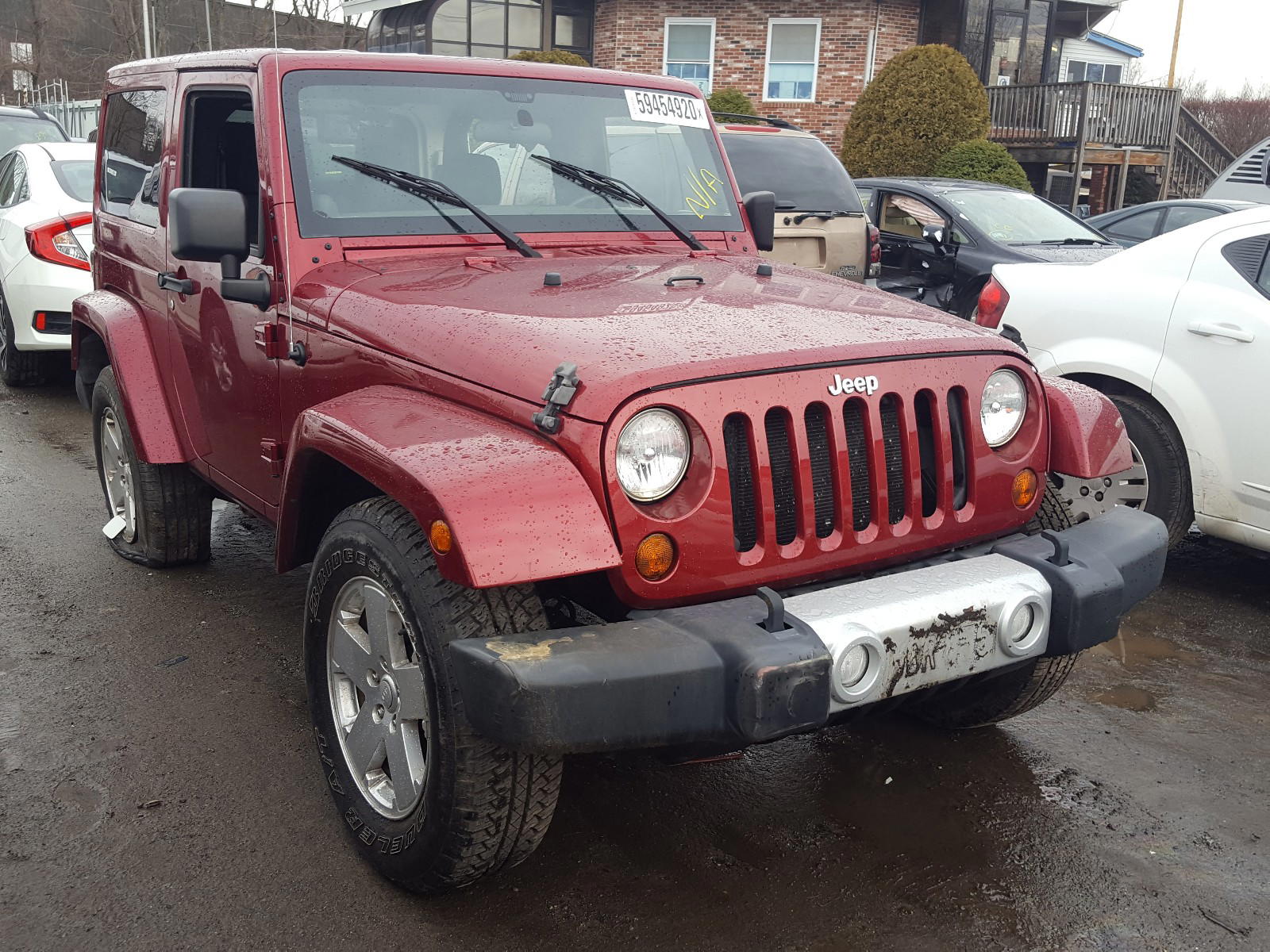 JEEP WRANGLER S 2011 with VIN 1J4AA5D15BL571982 - Photo from auction