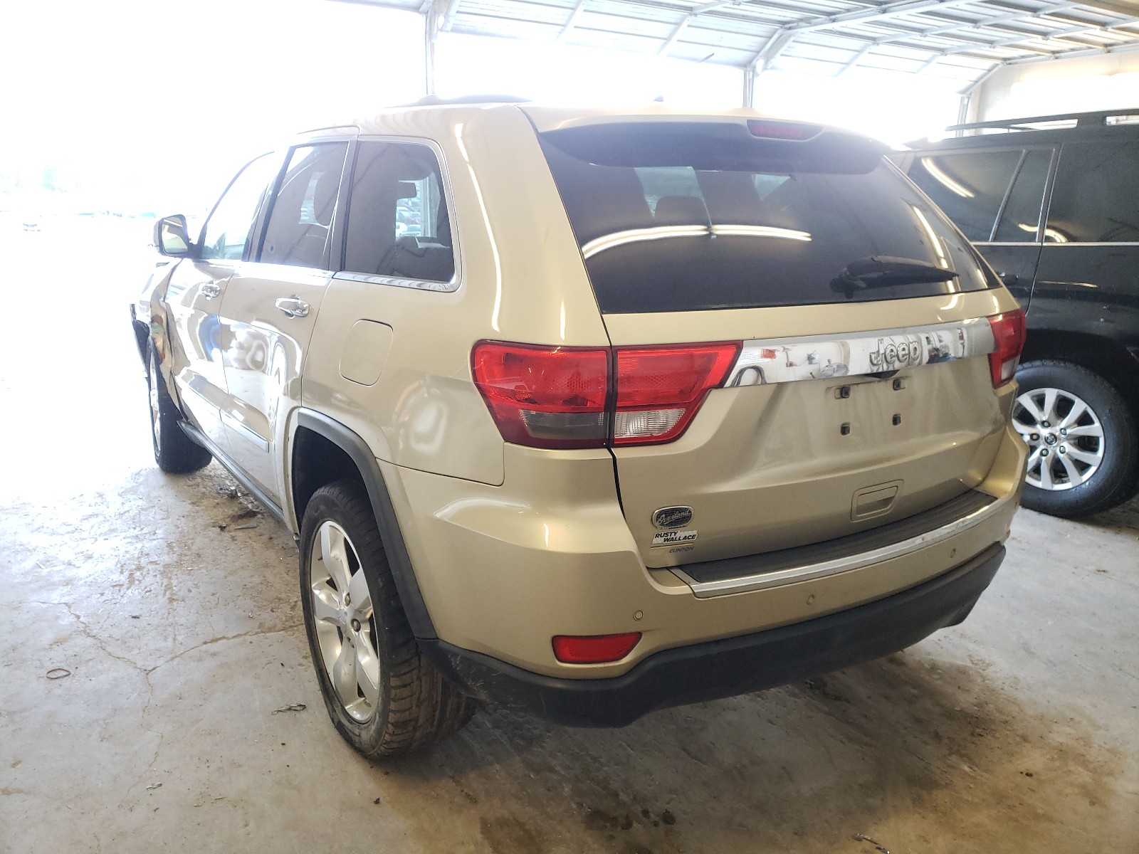 Photo 3 from auction – 2011 JEEP GRAND CHER with VIN 1J4RS6GG5BC621818