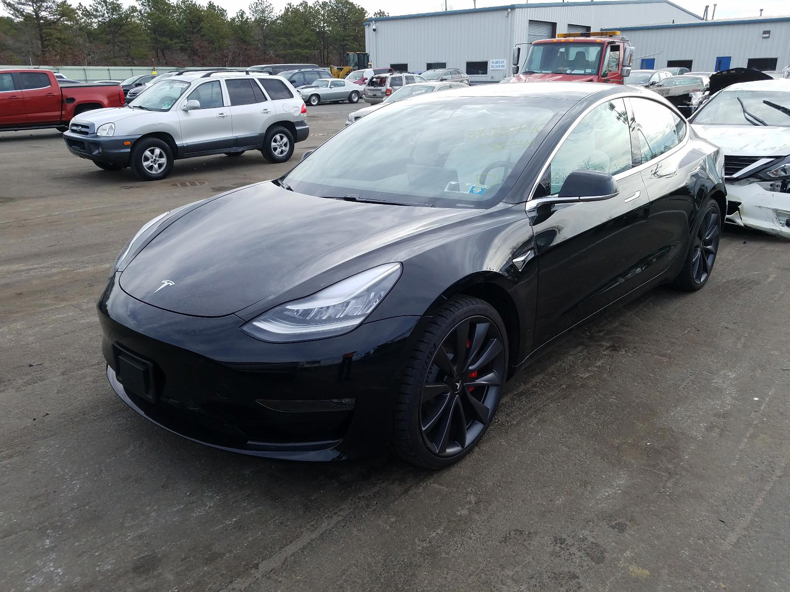Photo 2 from auction – 2020 TESLA MODEL 3 with VIN 5YJ3E1ECXLF736344