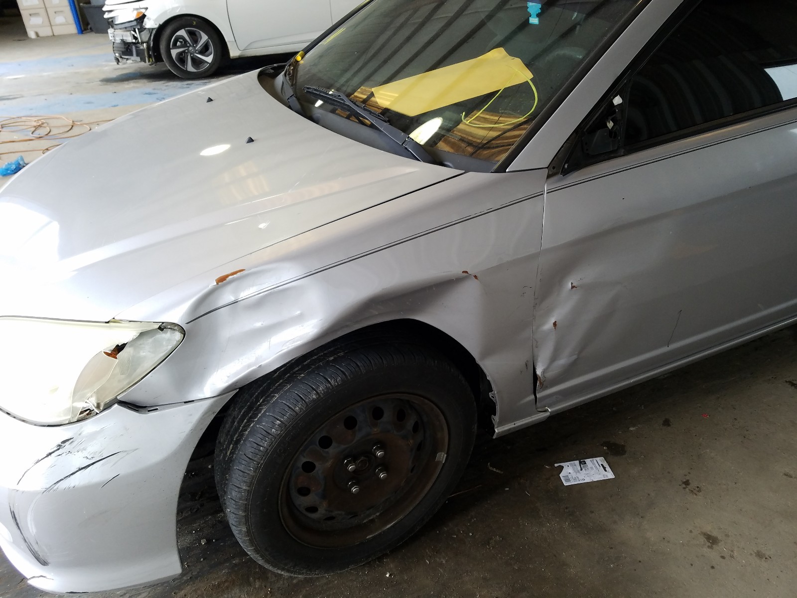 Photo 9 from auction – 2004 HONDA CIVIC LX with VIN 1HGEM22564L003232