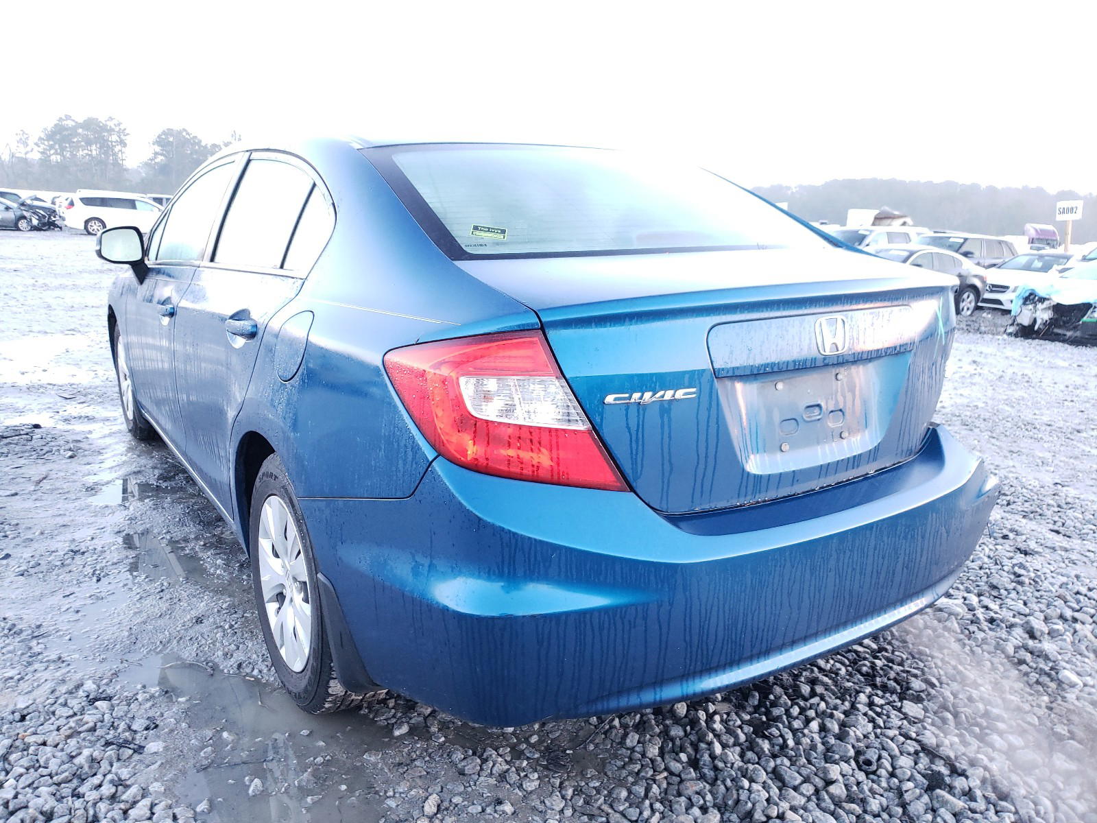 Photo 3 from auction – 2012 HONDA CIVIC LX with VIN 19XFB2F59CE060423