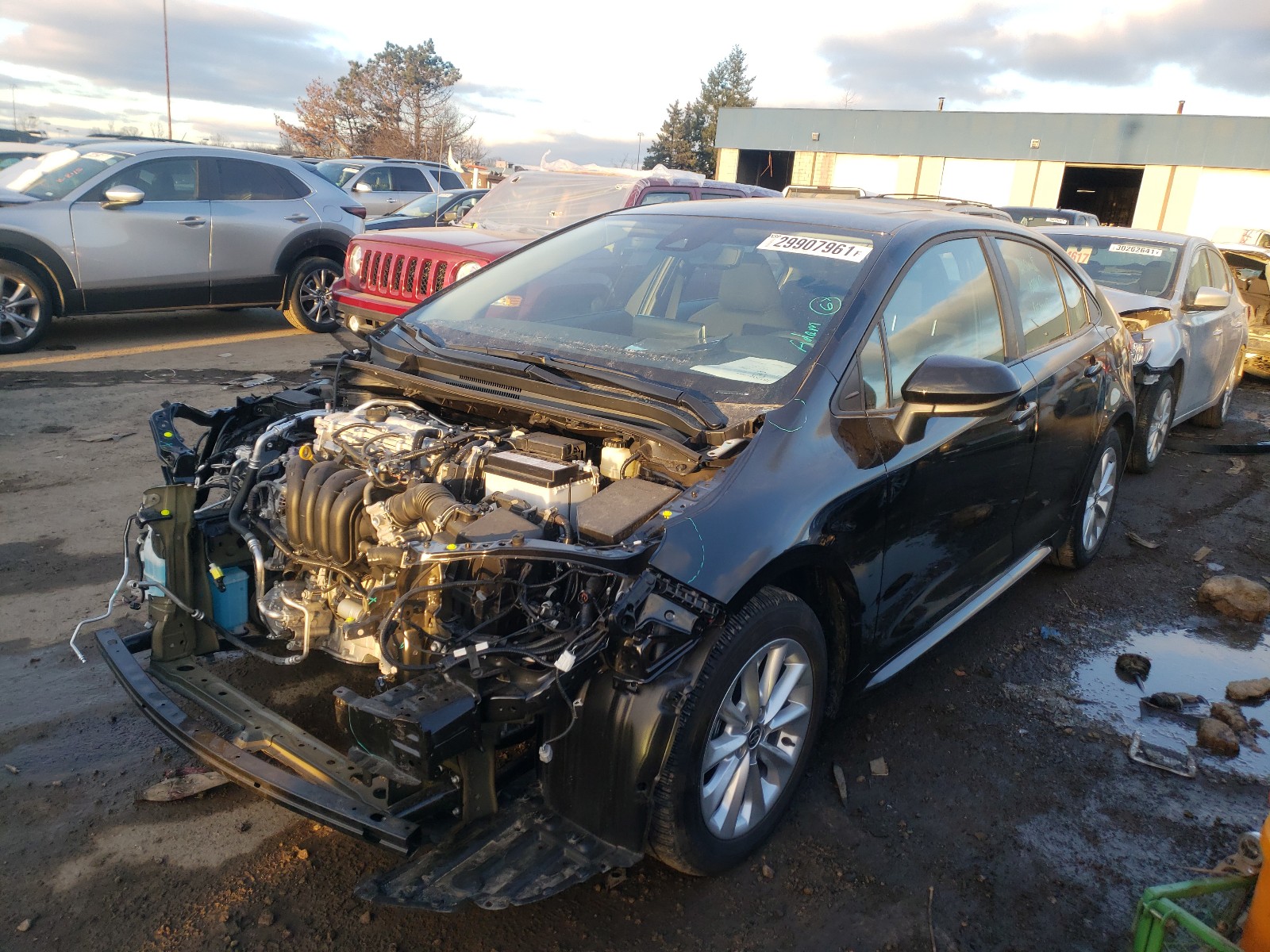 Photo 2 from auction – 2021 TOYOTA COROLLA LE with VIN 5YFHPMAE0MP163971