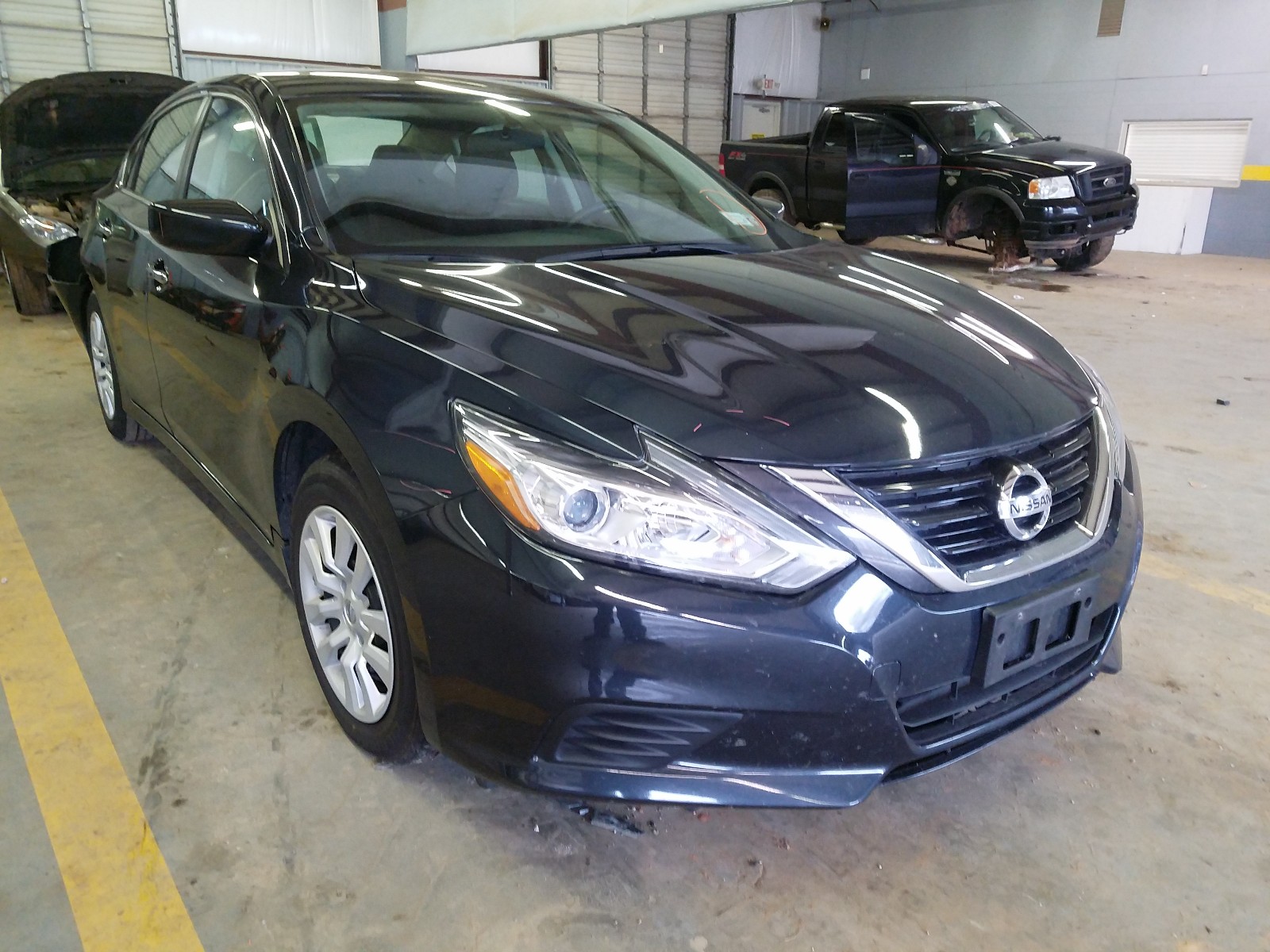 NISSAN ALTIMA 2.5 2018 with VIN 1N4AL3AP7JC123468 - Photo from auction