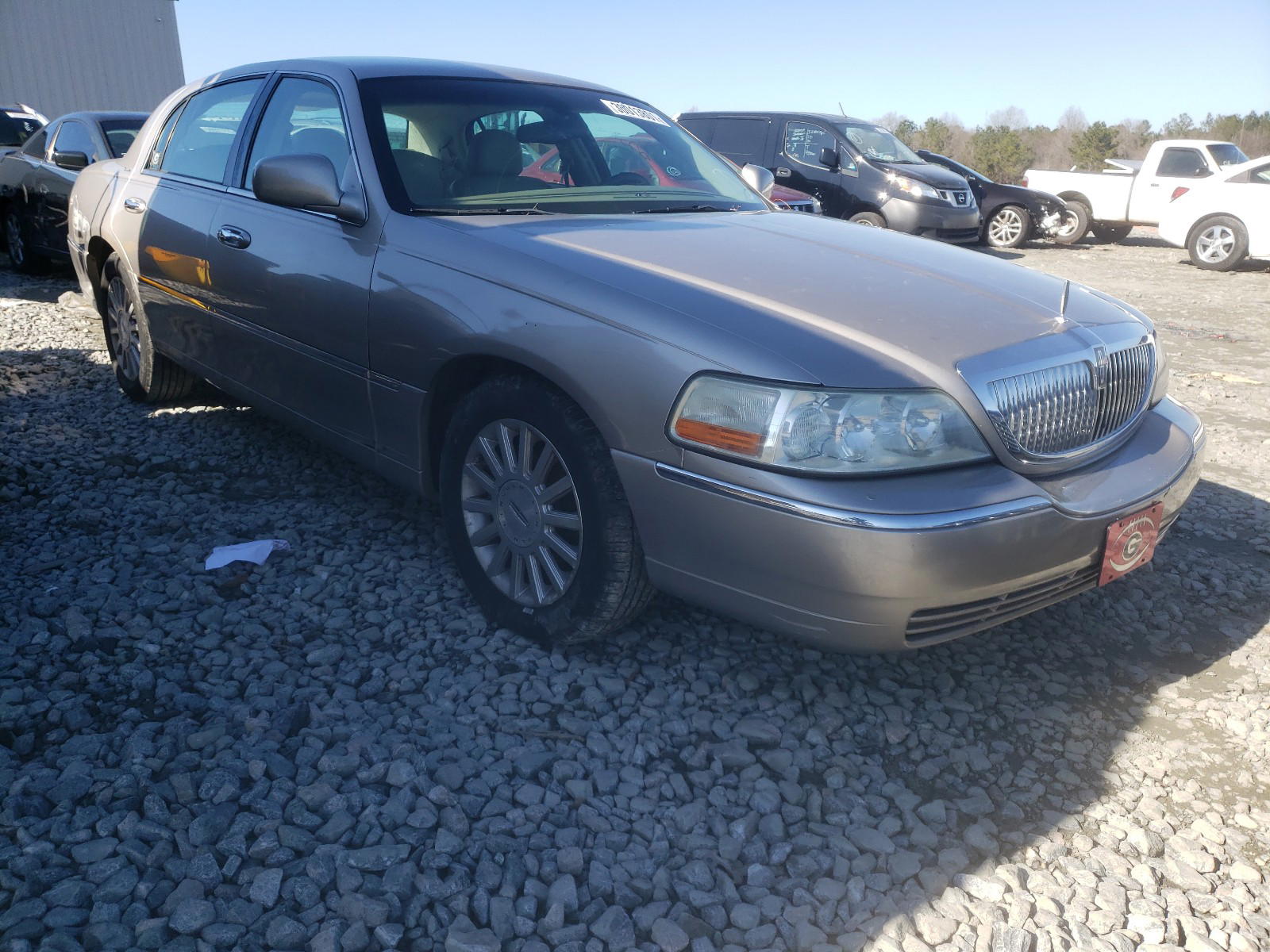 LINCOLN TOWN CAR E 2003 with VIN 1LNHM81W23Y696919 - Photo from auction