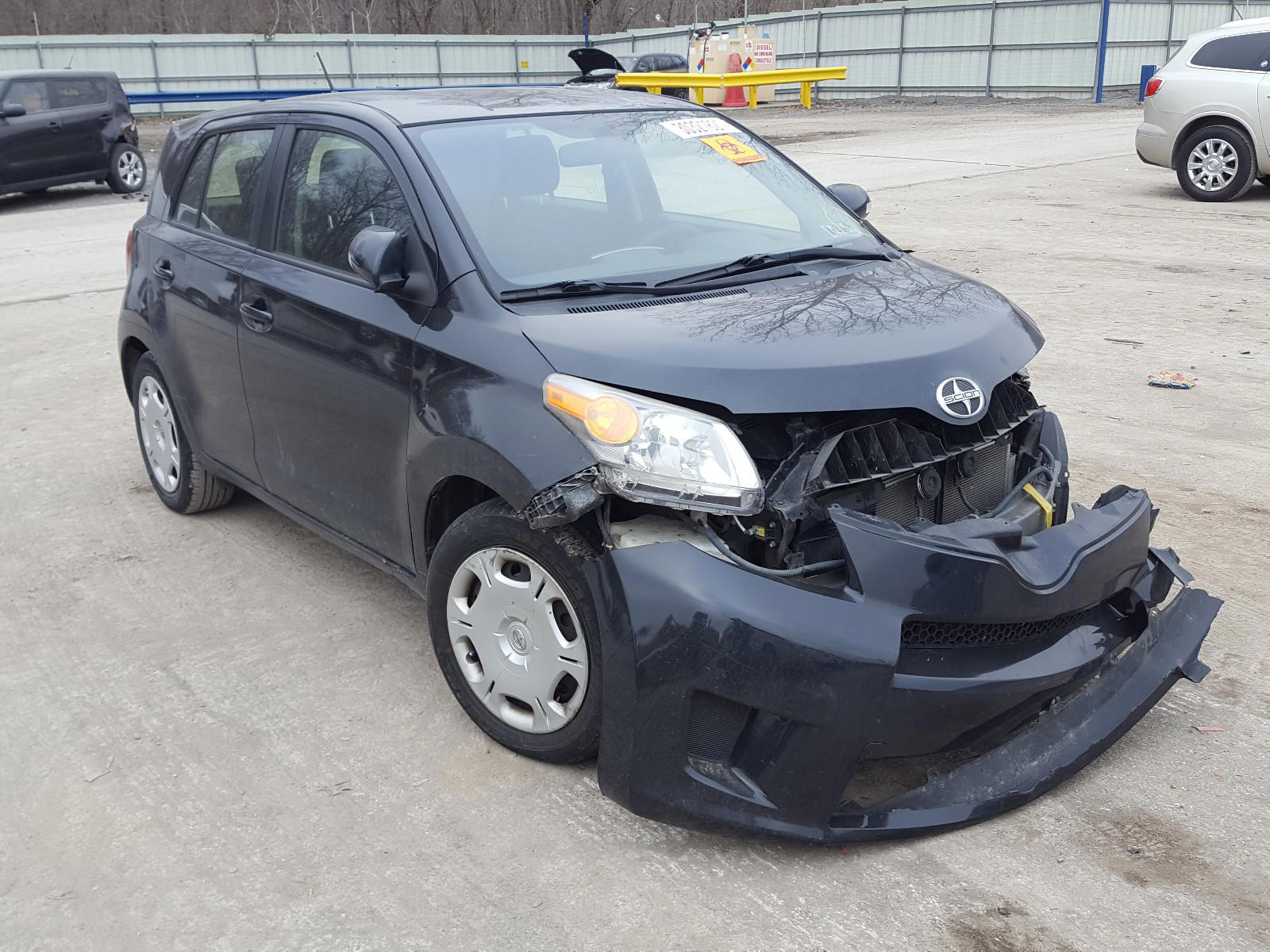 SCION XD 2014 with VIN JTKKUPB46E1043287 - Photo from auction