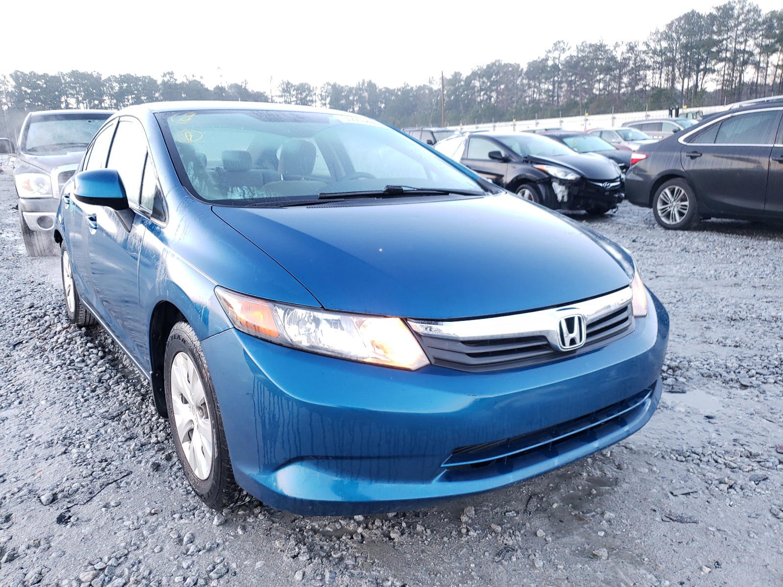 HONDA CIVIC LX 2012 with VIN 19XFB2F59CE060423 - Photo from auction