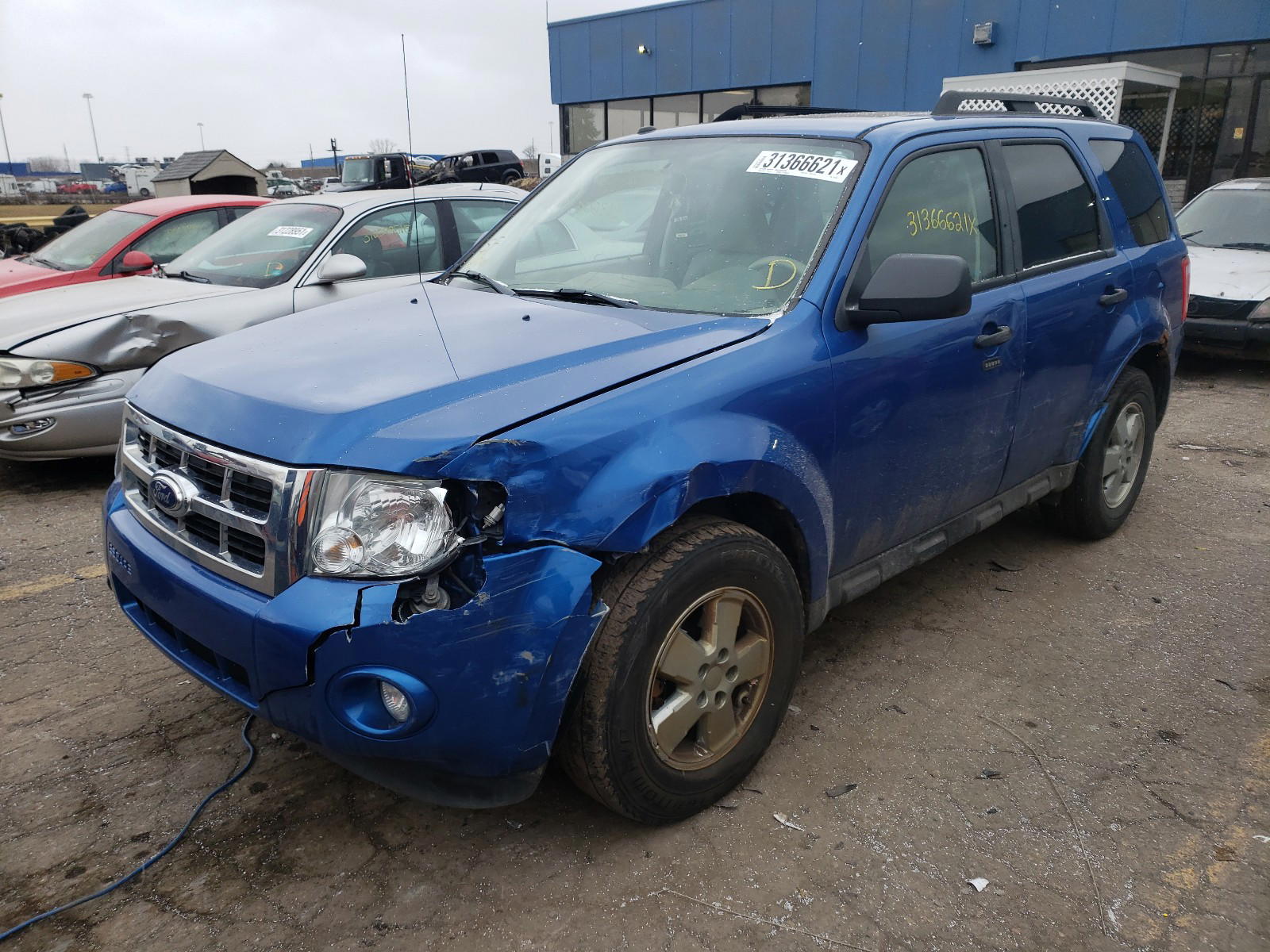 Photo 2 from auction – 2011 FORD ESCAPE with VIN 1FMCU9D72BKB23279