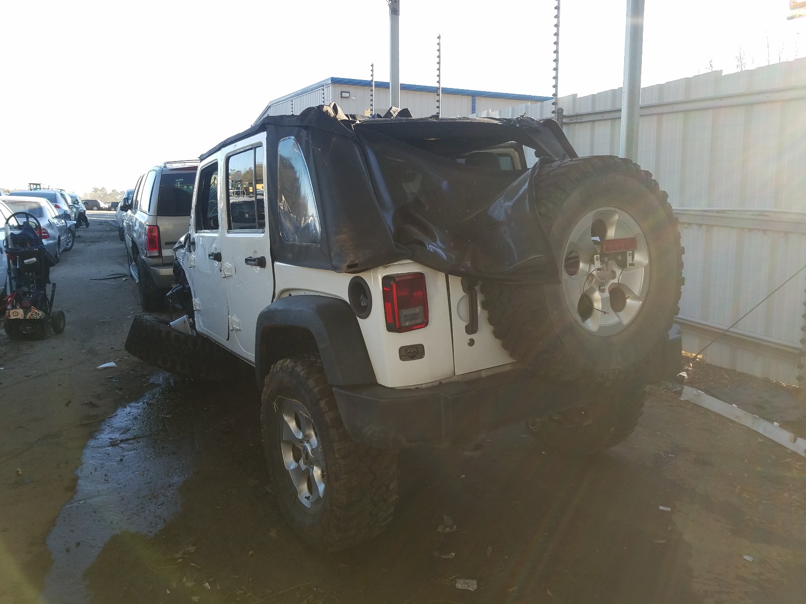 Photo 3 from auction – 2015 JEEP WRANGLER U with VIN 1C4BJWDG0FL663379