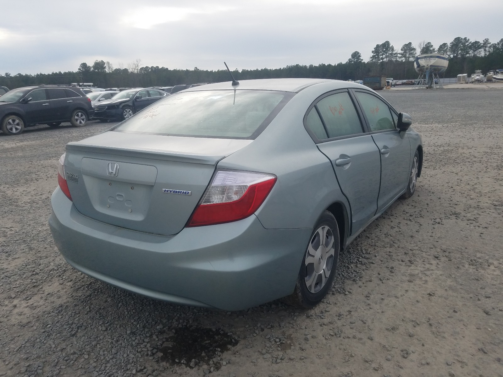 Photo 4 from auction – 2012 HONDA CIVIC HYBR with VIN JHMFB4F26CS000077