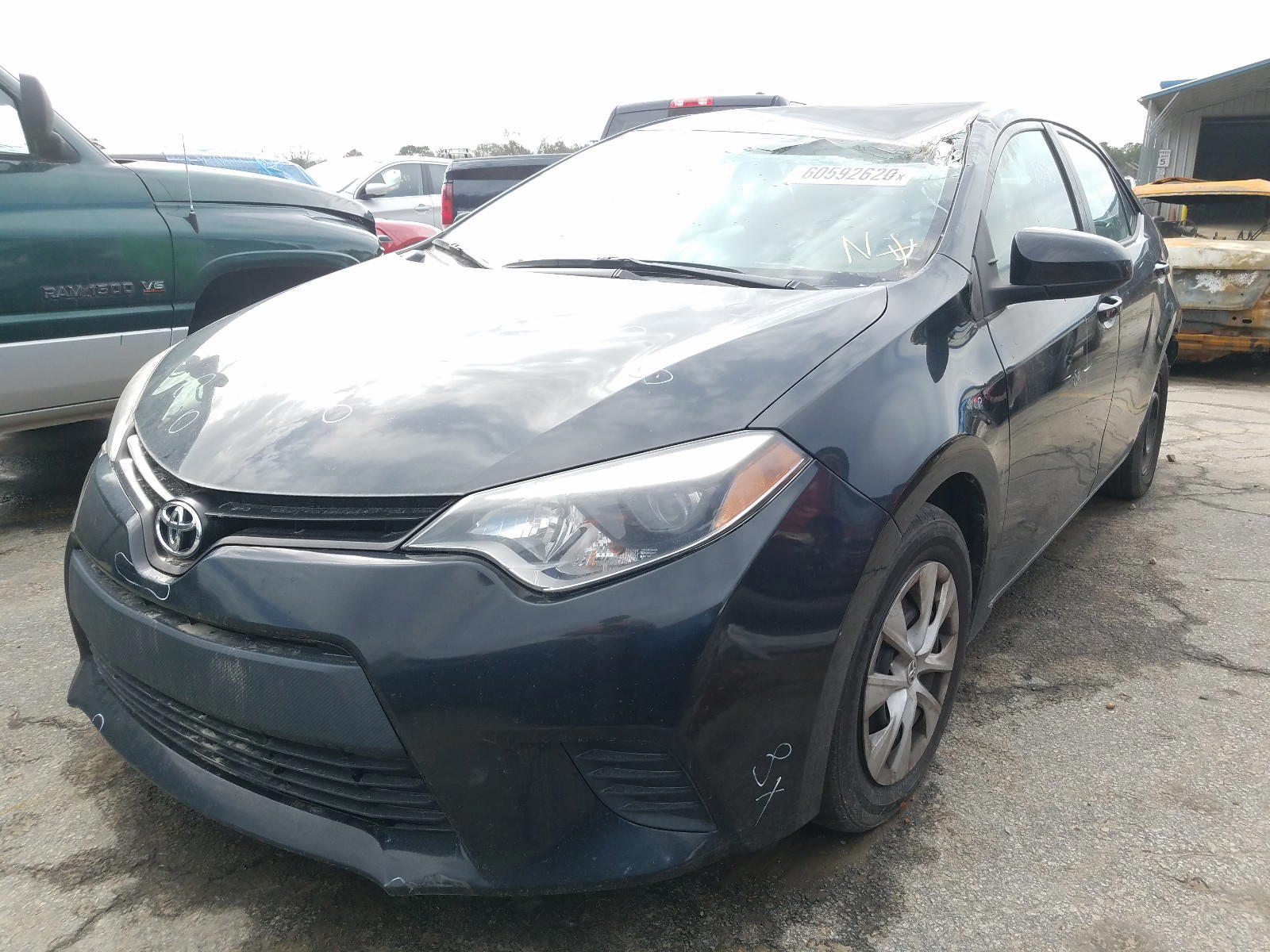 Photo 2 from auction – 2014 TOYOTA COROLLA L with VIN 2T1BURHE0EC061024