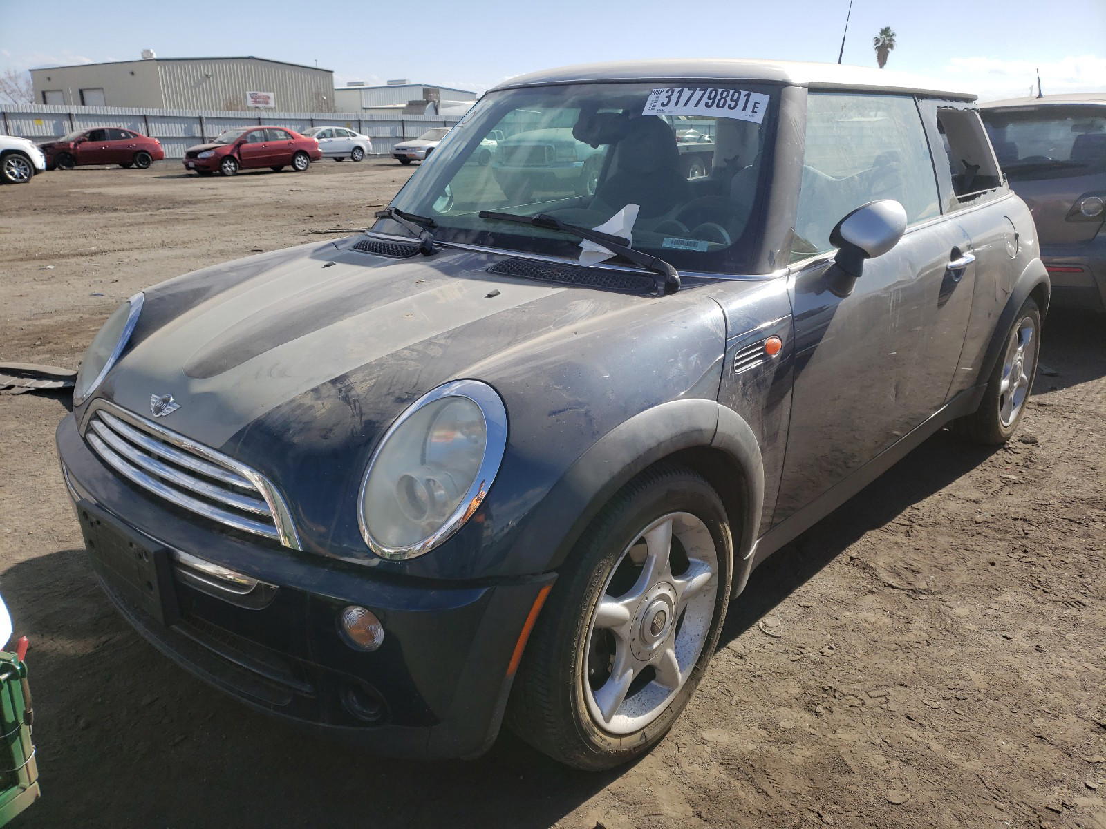 Photo 2 from auction – 2006 MINI COOPER with VIN WMWRC33556TK17023