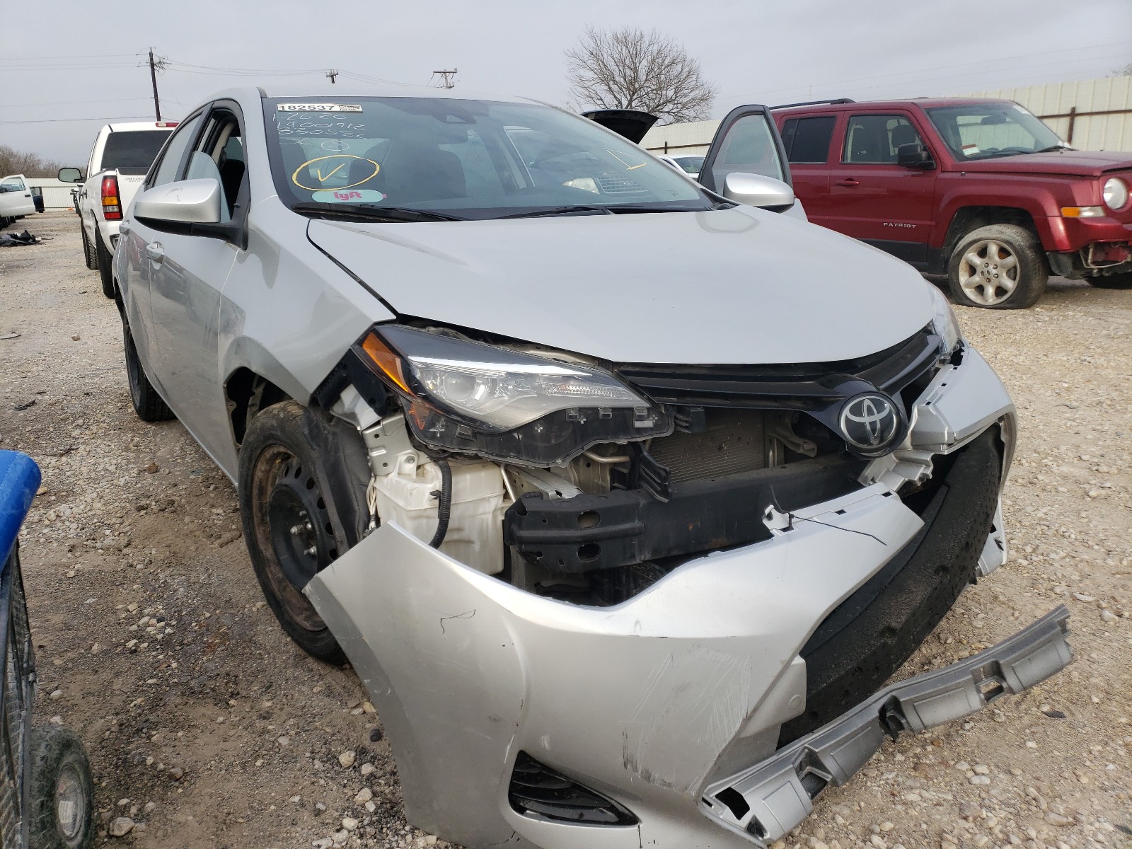 TOYOTA COROLLA L 2018 with VIN 5YFBURHE9JP830582 - Photo from auction