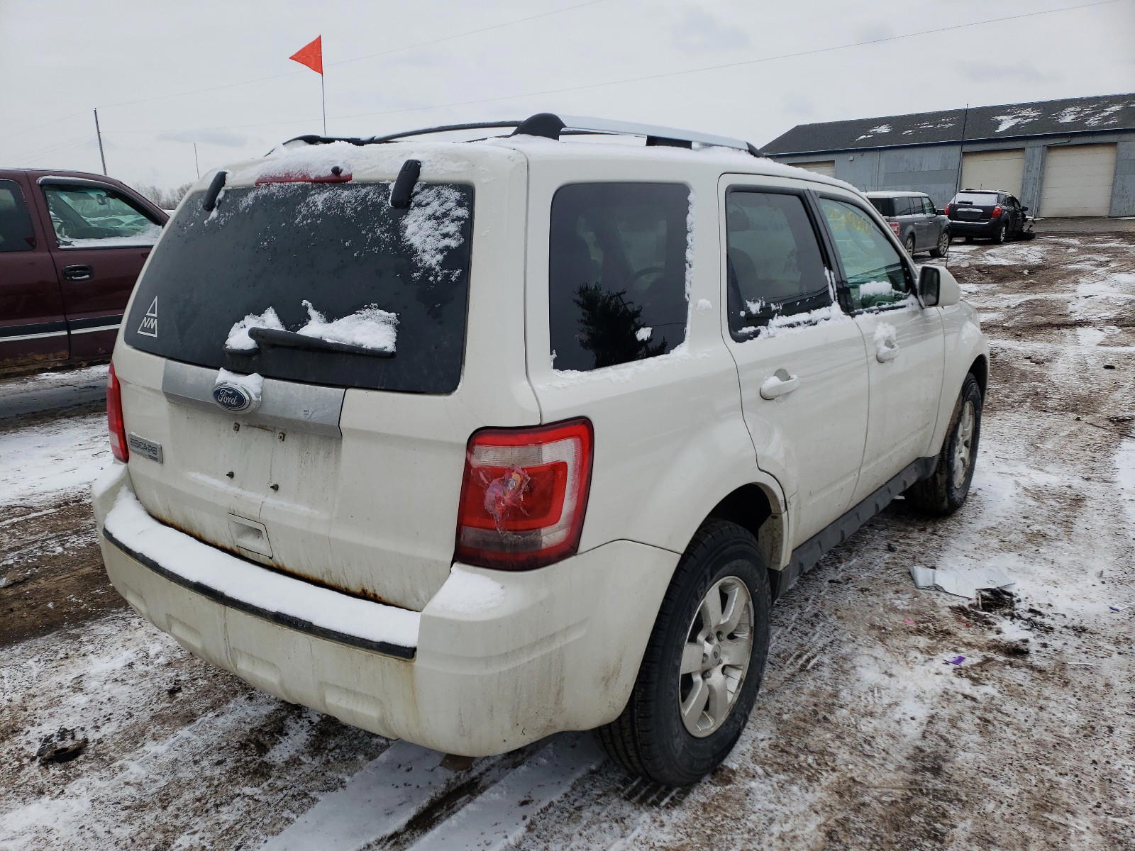 Photo 4 from auction – 2011 FORD ESCAPE LIM with VIN 1FMCU9E76BKB54551