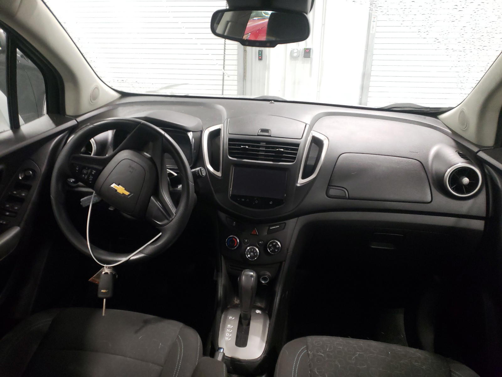 Photo 9 from auction – 2016 CHEVROLET TRAX LS with VIN KL7CJKSB0GB587767