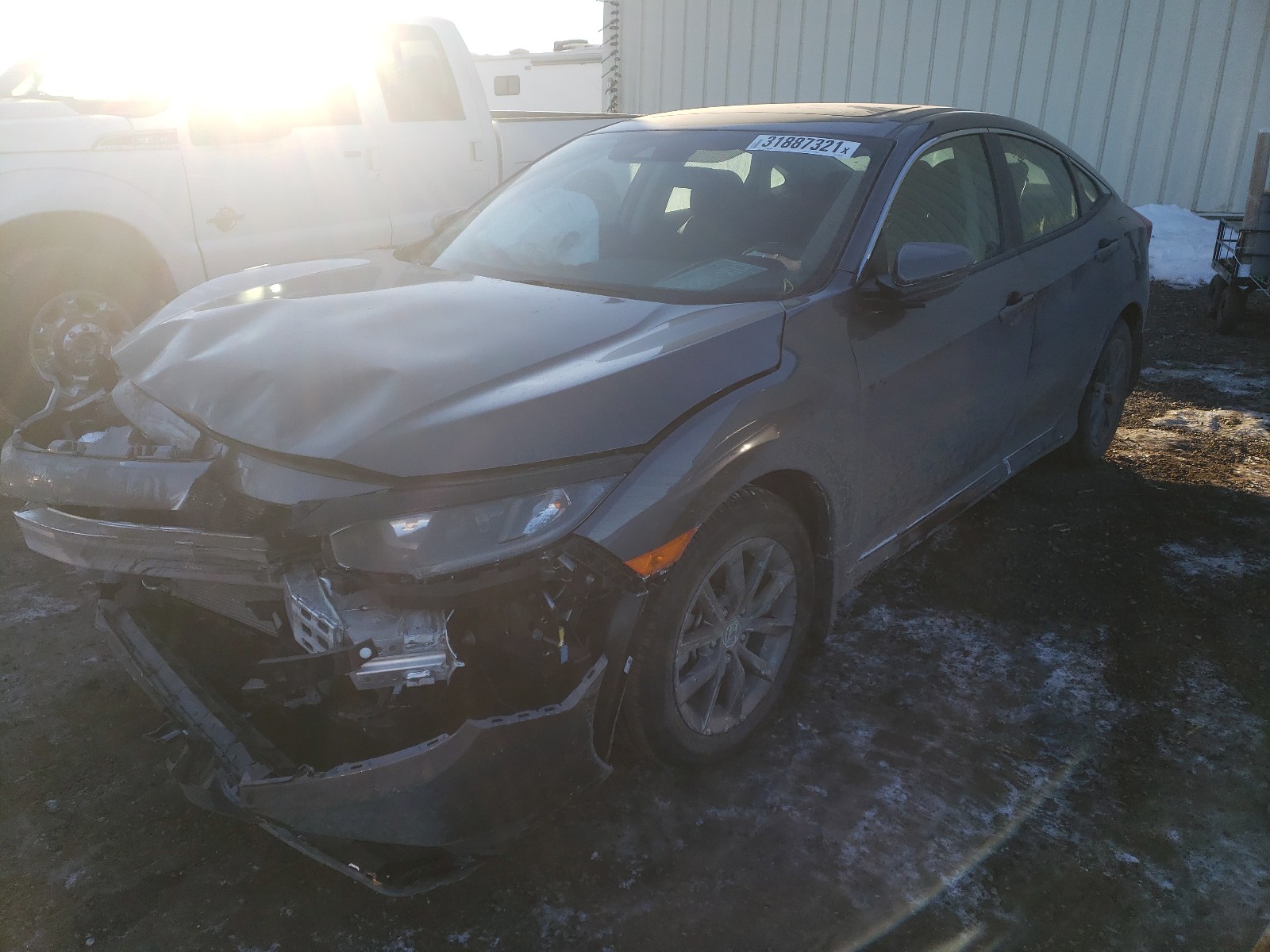 Photo 2 from auction – 2020 HONDA CIVIC EX with VIN 2HGFC2F77LH028476