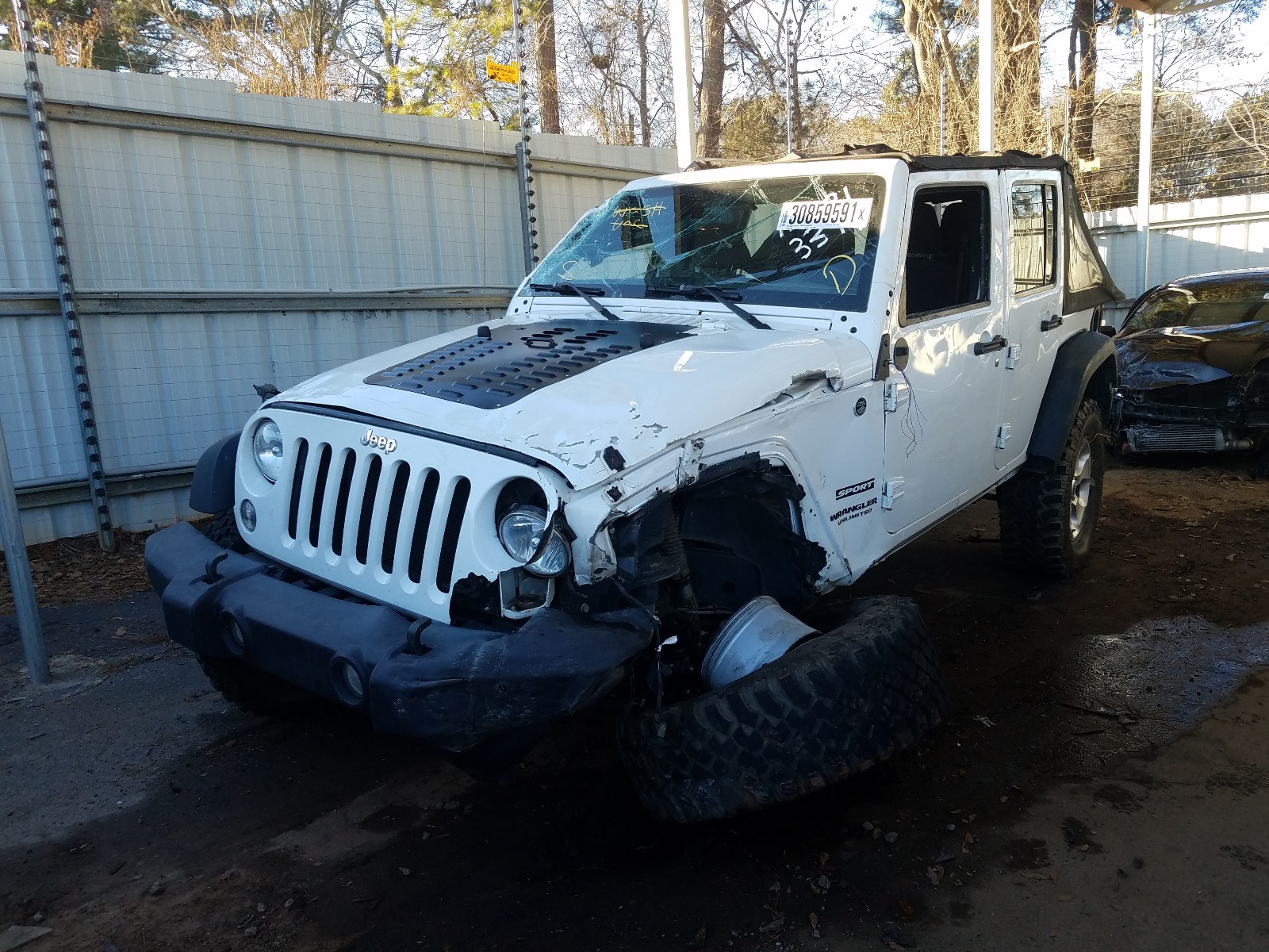 Photo 2 from auction – 2015 JEEP WRANGLER U with VIN 1C4BJWDG0FL663379