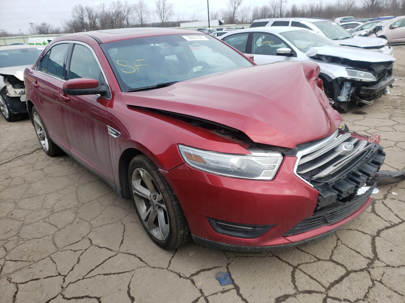 FORD TAURUS SEL 2014 with VIN 1FAHP2E84EG129016 - Photo from auction