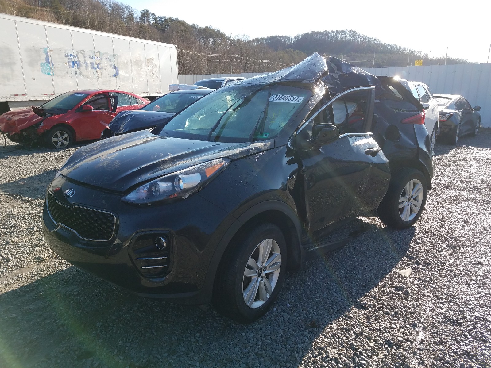 Photo 2 from auction – 2019 KIA SPORTAGE L with VIN KNDPMCAC2K7531319