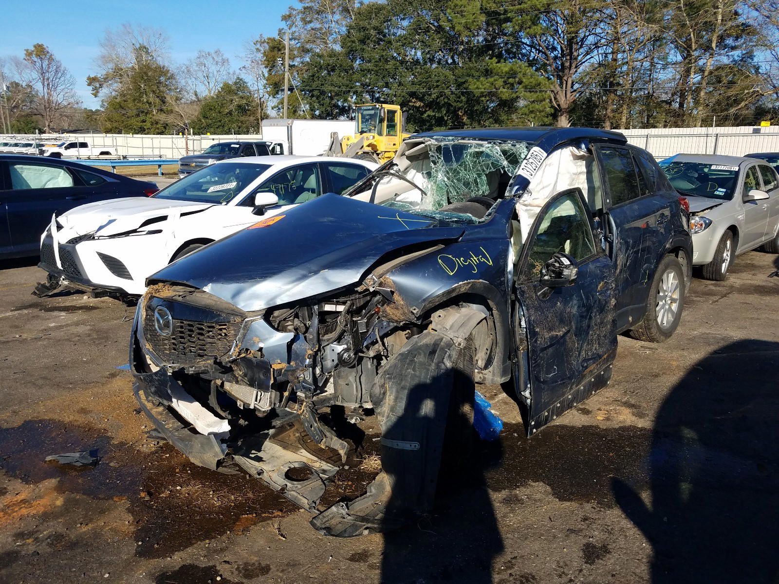 Photo 2 from auction – 2014 MAZDA CX-5 TOURI with VIN JM3KE2CY3E0410068