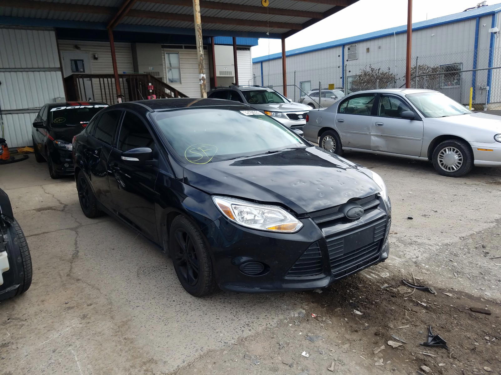 FORD FOCUS SE 2014 with VIN 1FADP3F28EL150537 - Photo from auction