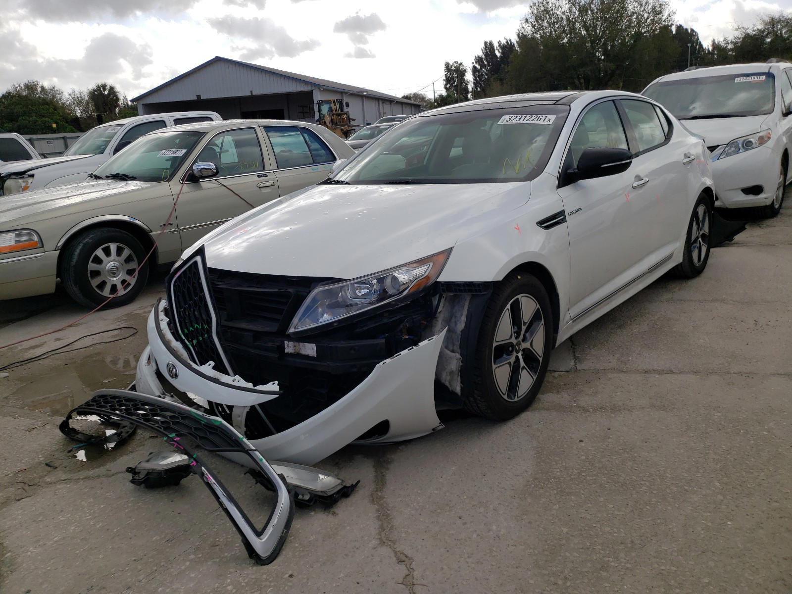 Photo 2 from auction – 2013 KIA OPTIMA HYB with VIN KNAGM4AD0D5049779