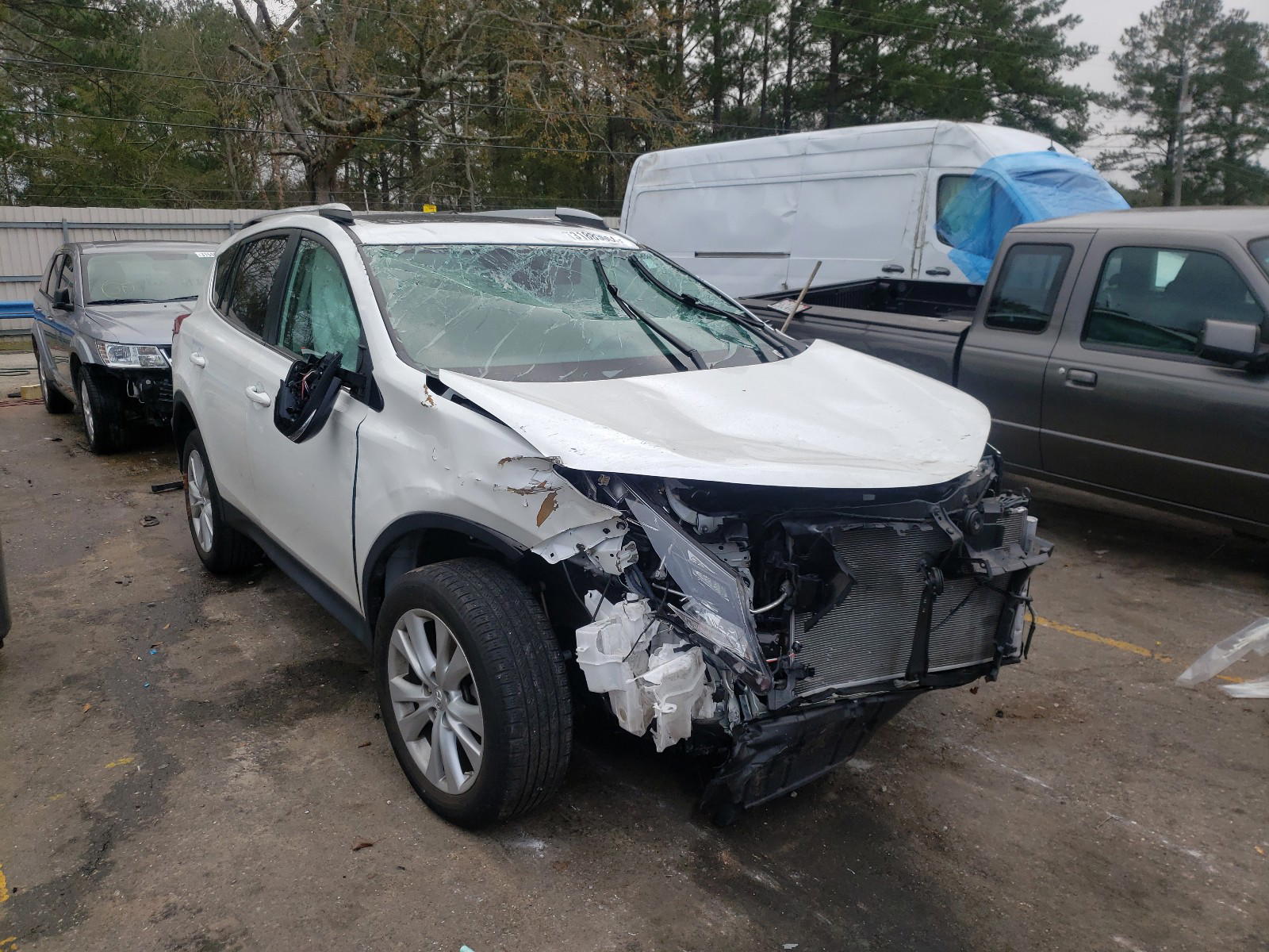 TOYOTA RAV4 LIMIT 2014 with VIN 2T3YFREV4EW094588 - Photo from auction