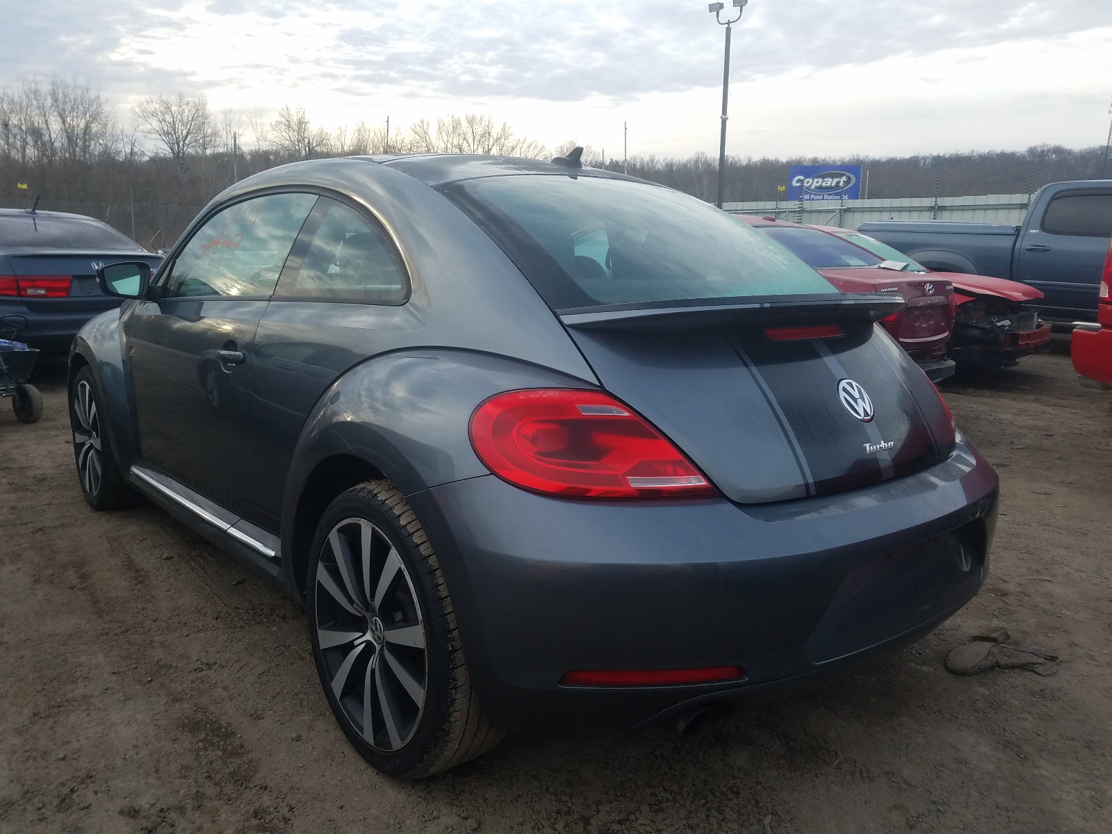 Photo 3 from auction – 2013 VOLKSWAGEN BEETLE TUR with VIN 3VWVA7AT7DM645815