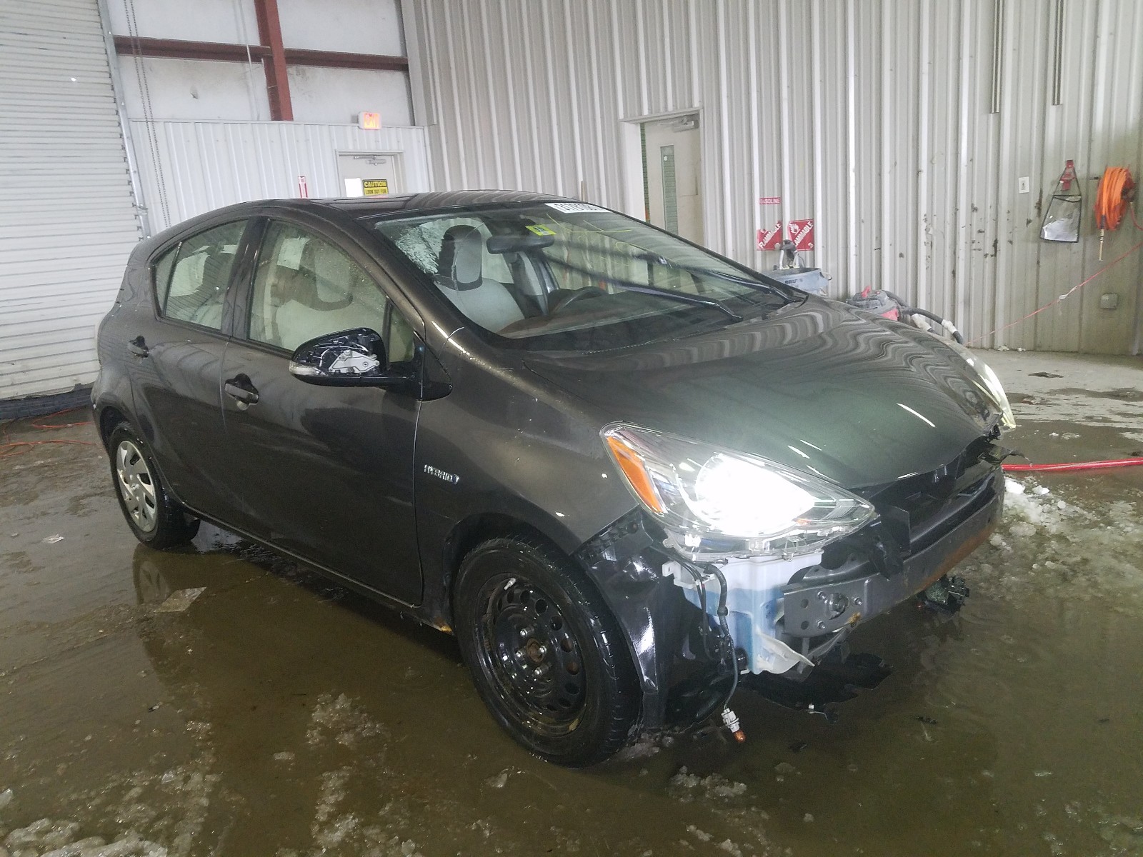 Photo 1 from auction – 2015 TOYOTA PRIUS C with VIN JTDKDTB38F1092922