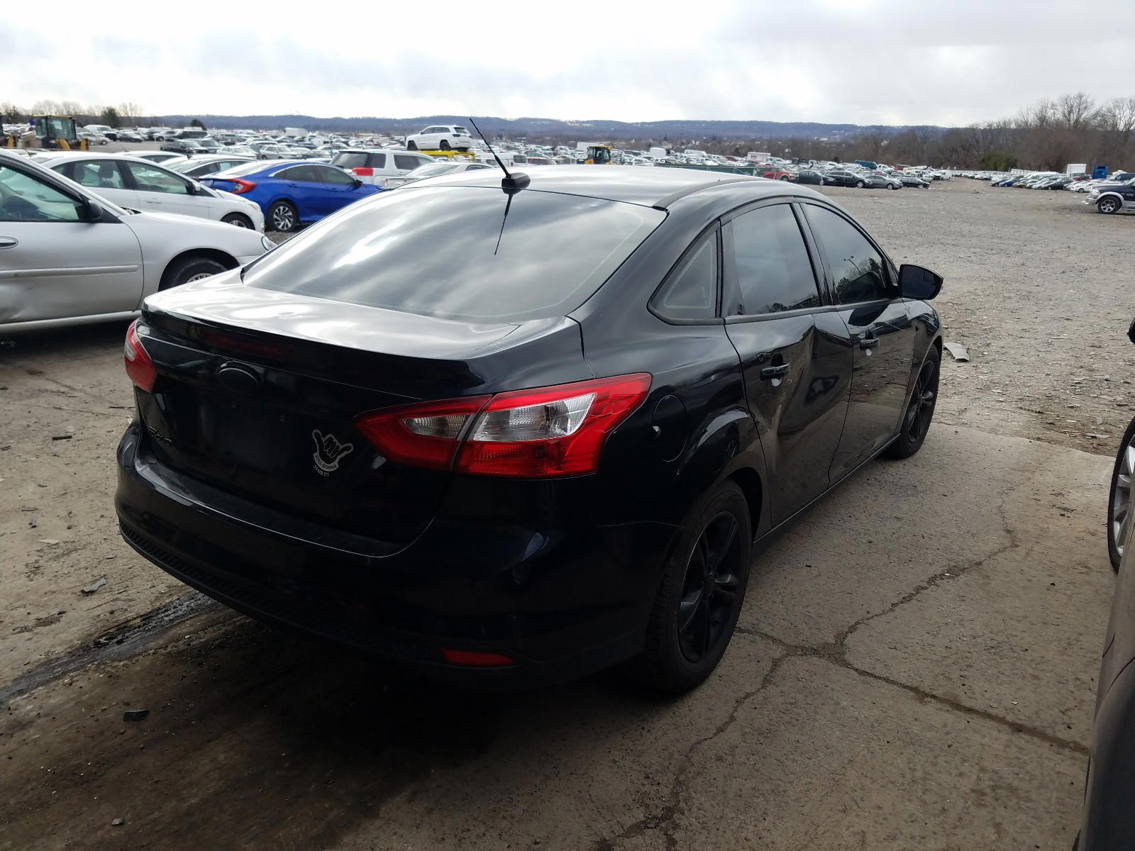 Photo 4 from auction – 2014 FORD FOCUS SE with VIN 1FADP3F28EL150537
