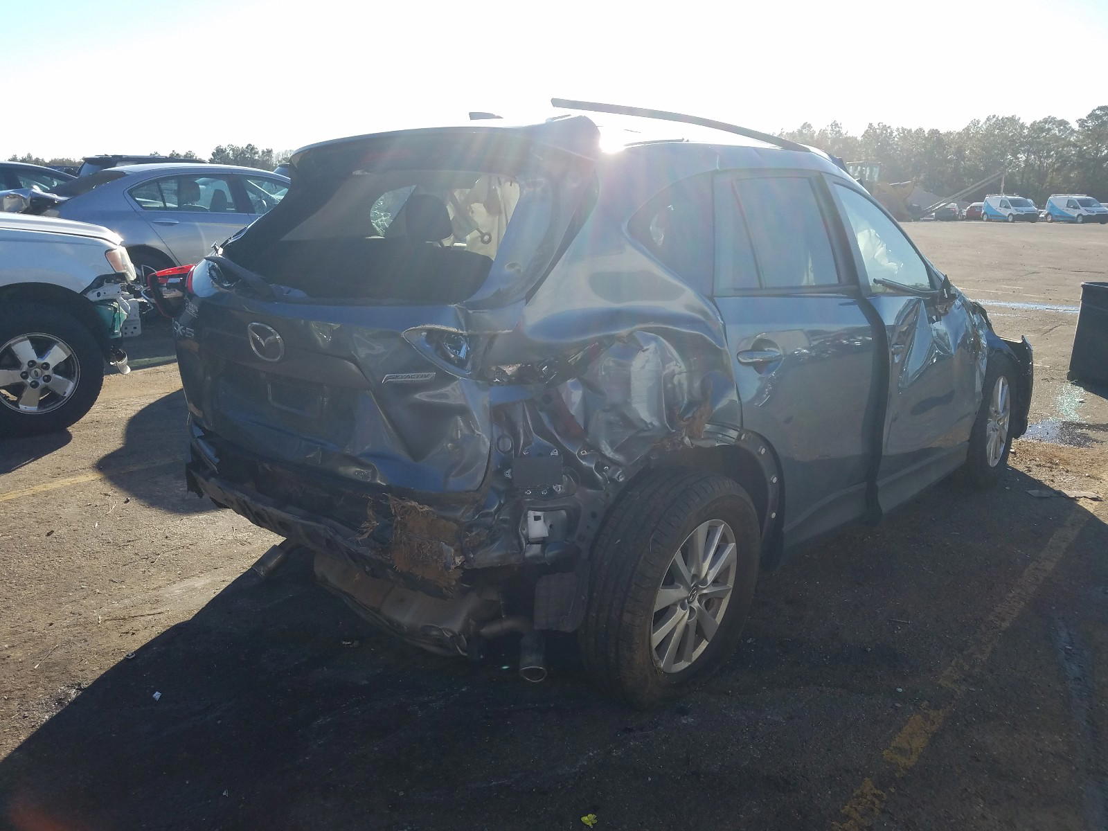 Photo 4 from auction – 2014 MAZDA CX-5 TOURI with VIN JM3KE2CY3E0410068