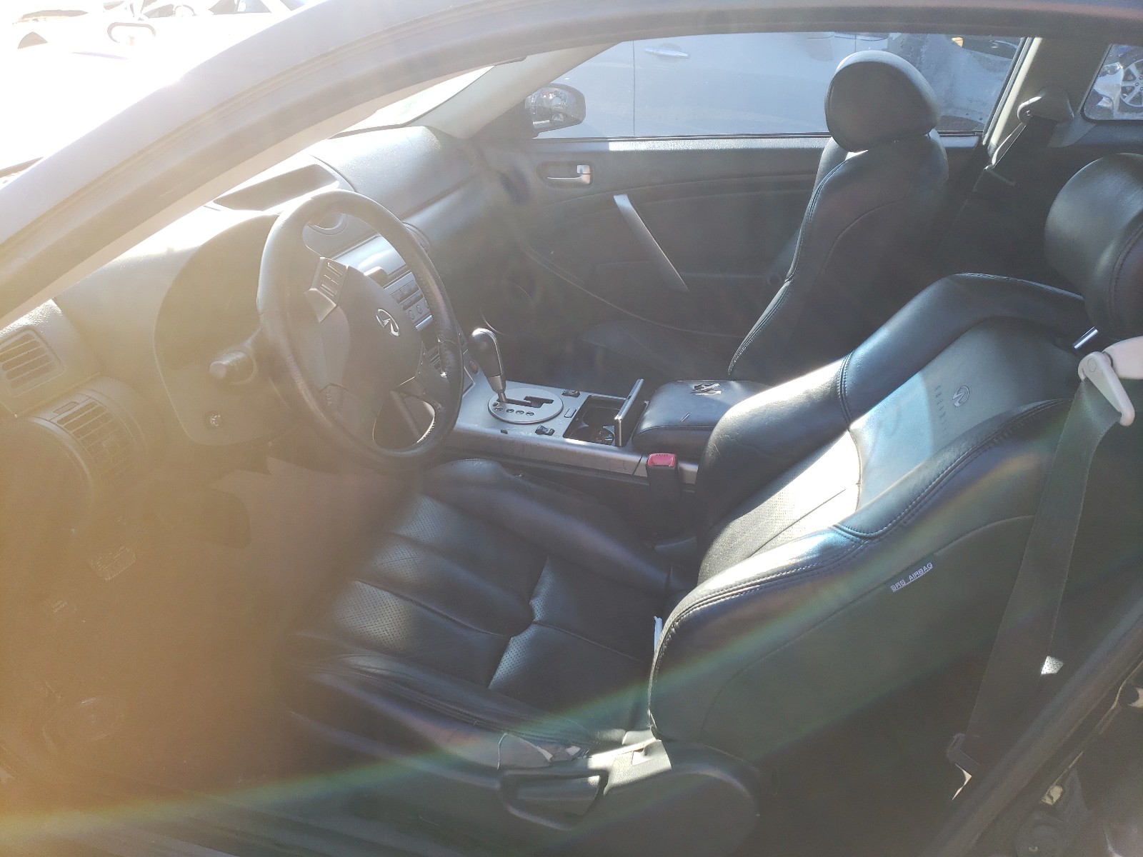 Photo 5 from auction – 2004 INFINITI G35 with VIN JNKCV54EX4M804353