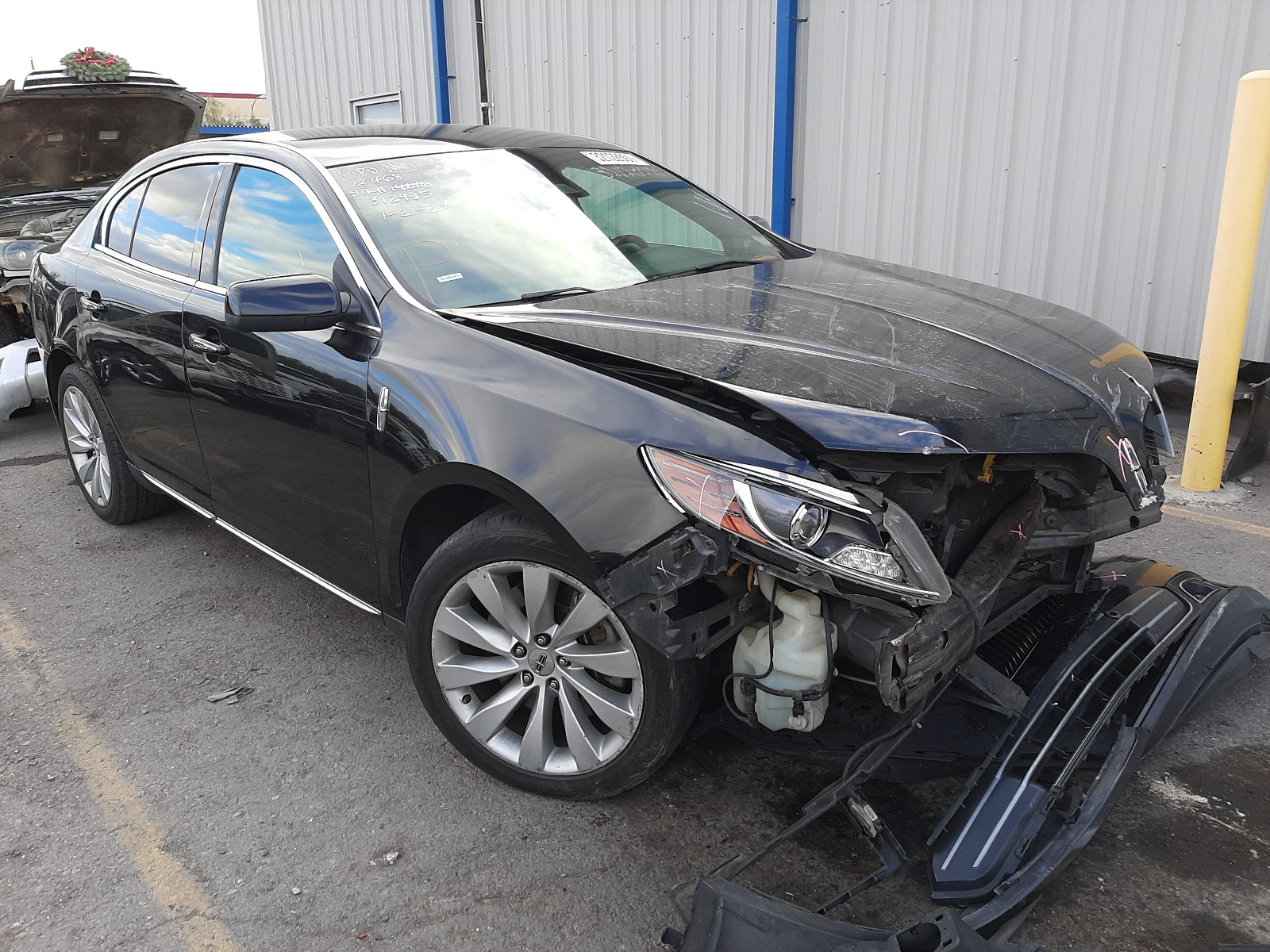 LINCOLN MKS 2014 with VIN 1LNHL9DKXEG608158 - Photo from auction