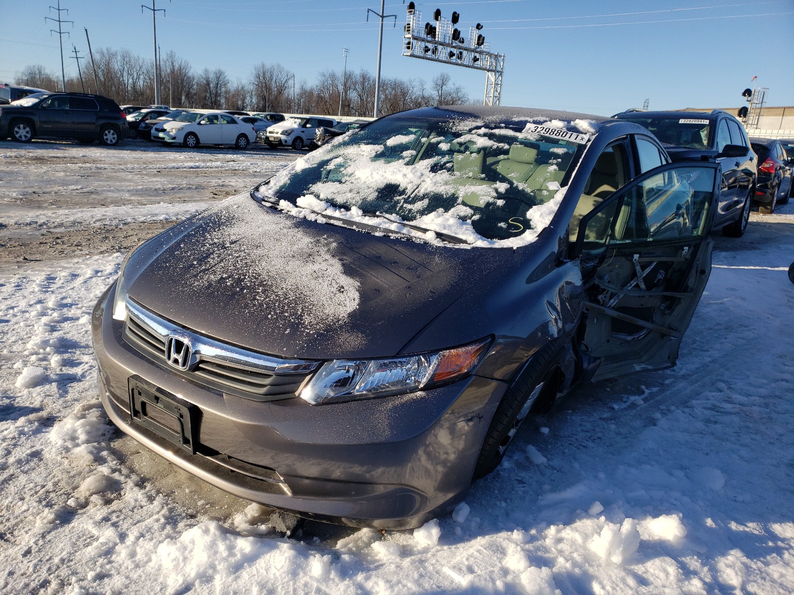 Photo 2 from auction – 2012 HONDA CIVIC LX with VIN 19XFB2F51CE092461